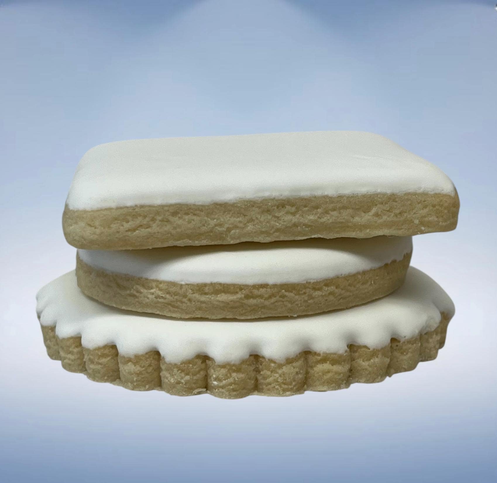 Stacked sugar cookies showing thickness and texture