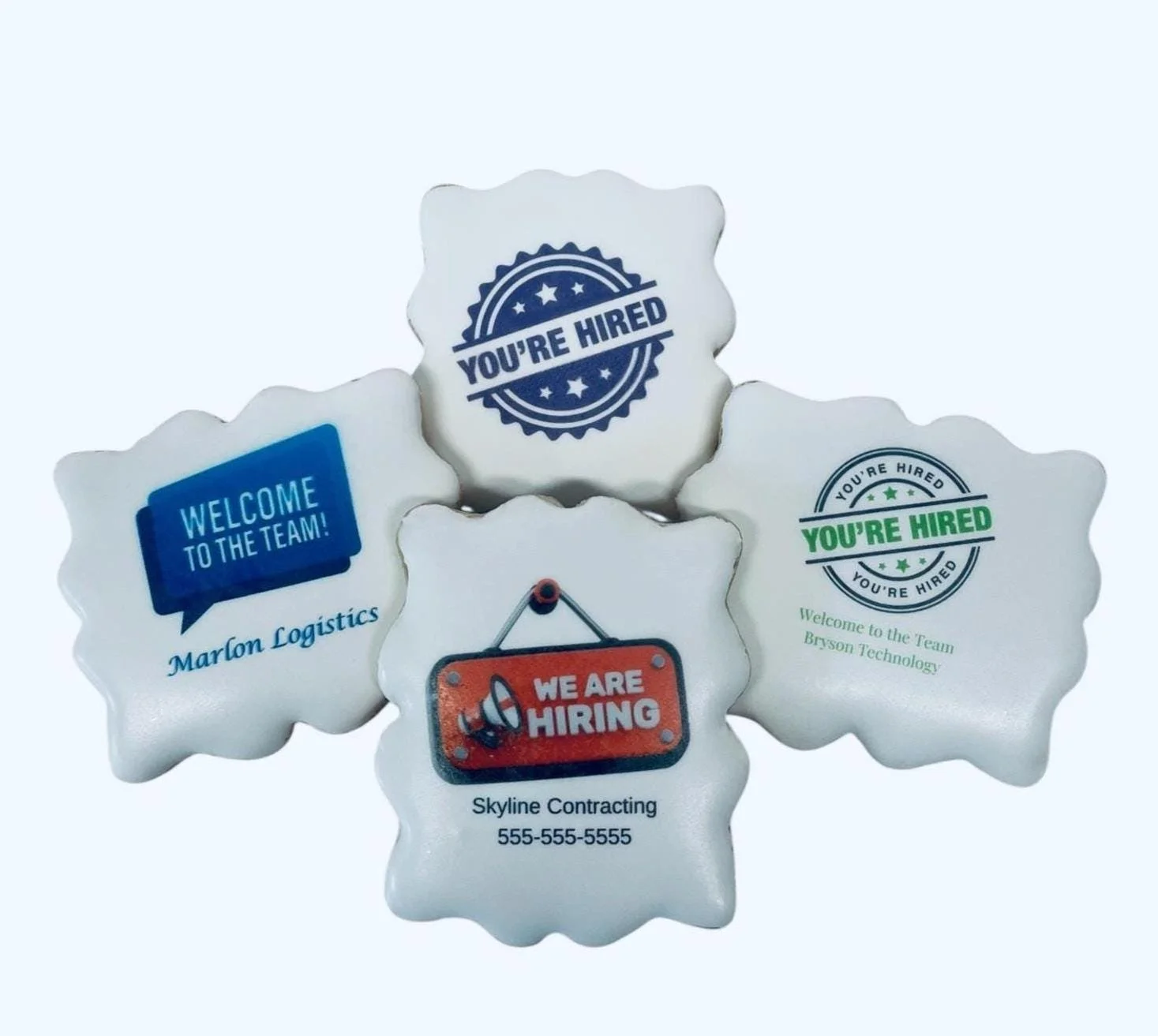 new hire cookies with company logos printed on royal icing sugar cookies