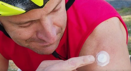 Man putting X39 patch on his arm