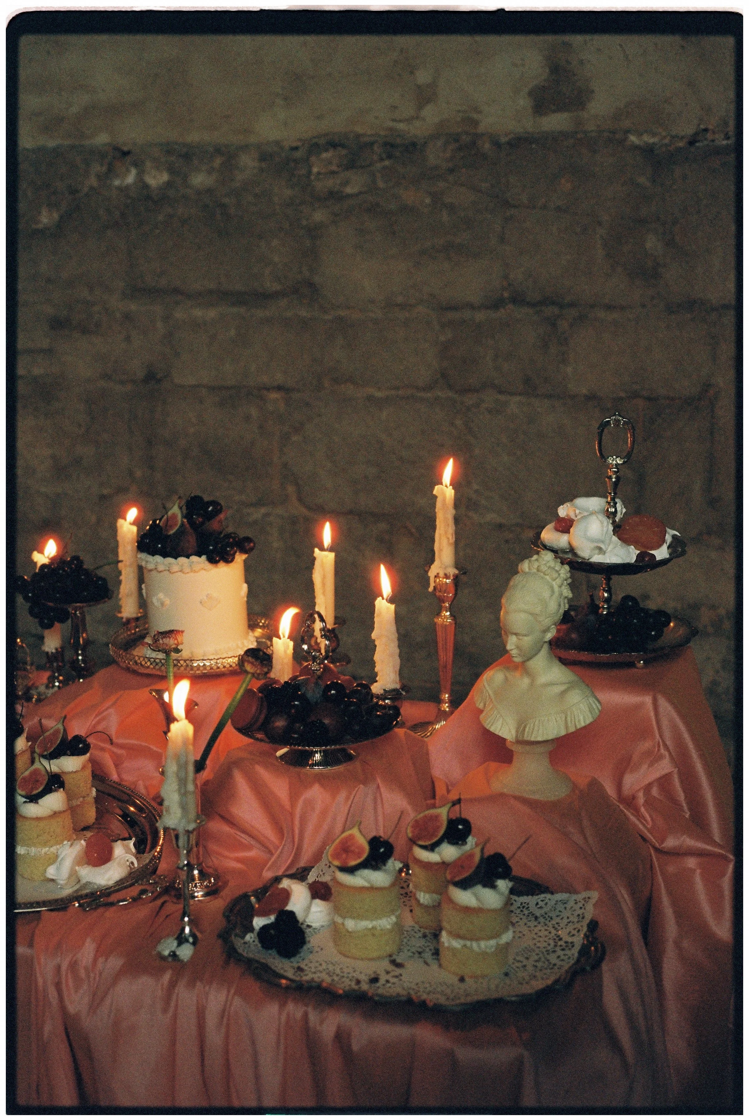 Victorian-inspired London wedding tablescape with blush satin, antique silverware and romantic floral styling