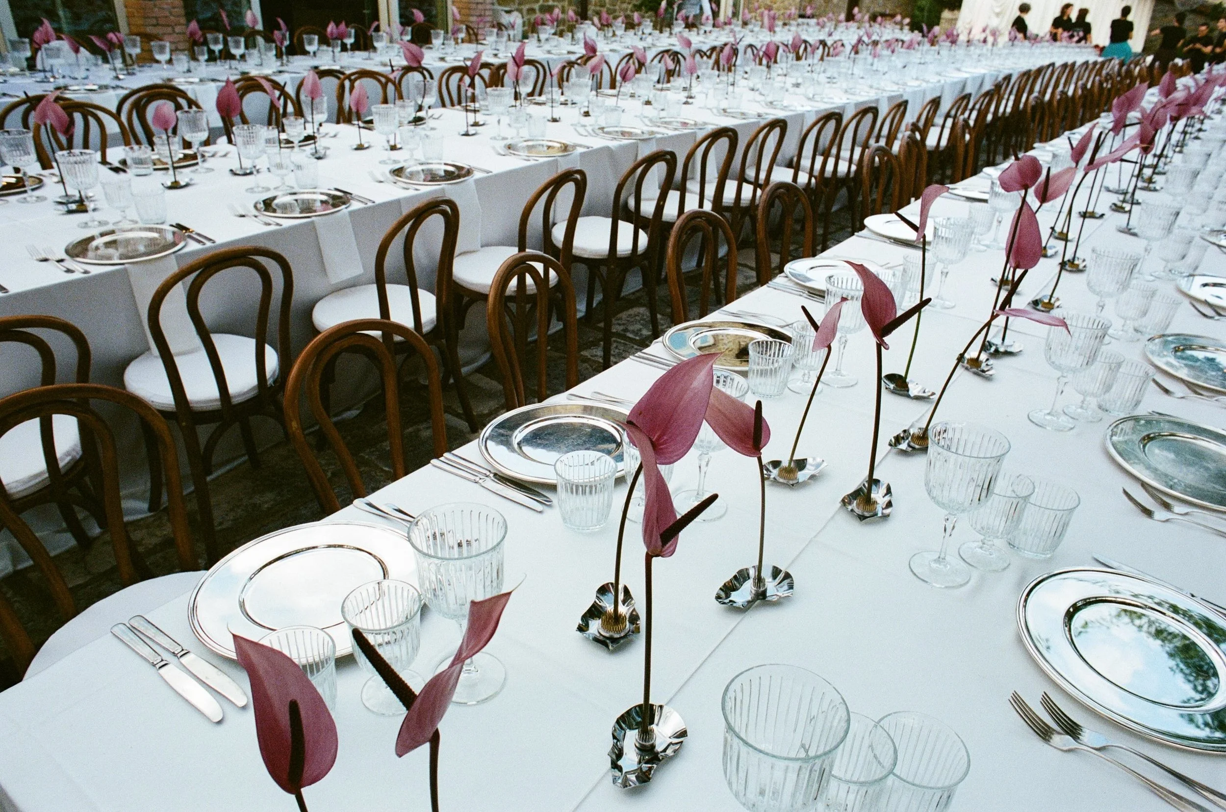 Multi-day Italian wedding culminating in an atmospheric evening reception with layered styling, creative direction and personalised details.
