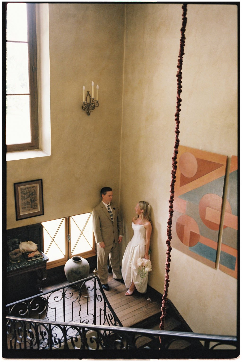 Bride and groom enjoying a romantic portrait in the gardens of Château Laborde Saint-Martin during their luxury Loire Valley destination wedding.
