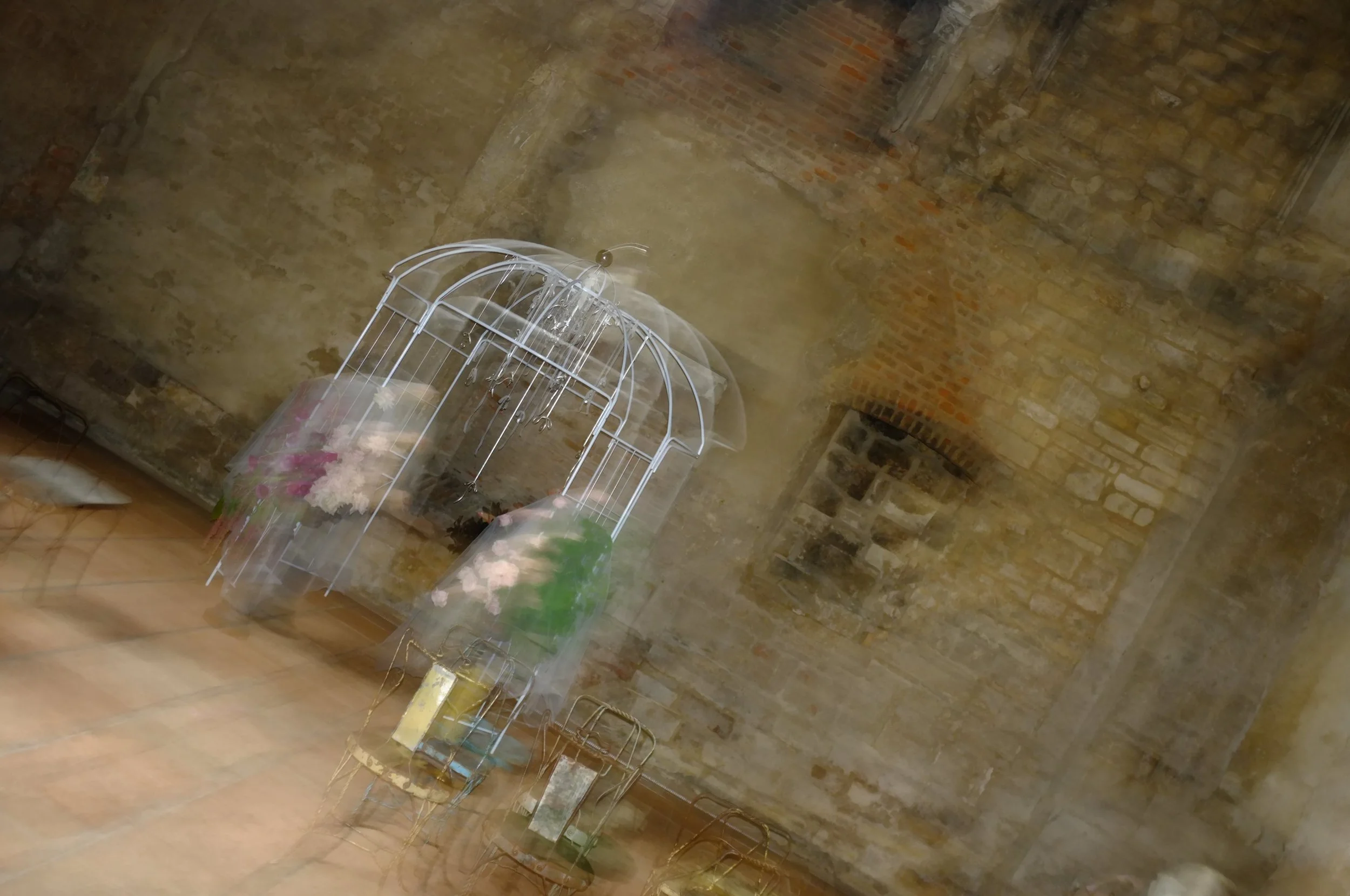 Creative design-led wedding setup with a vintage pergola and elegant luxury ceremony styling