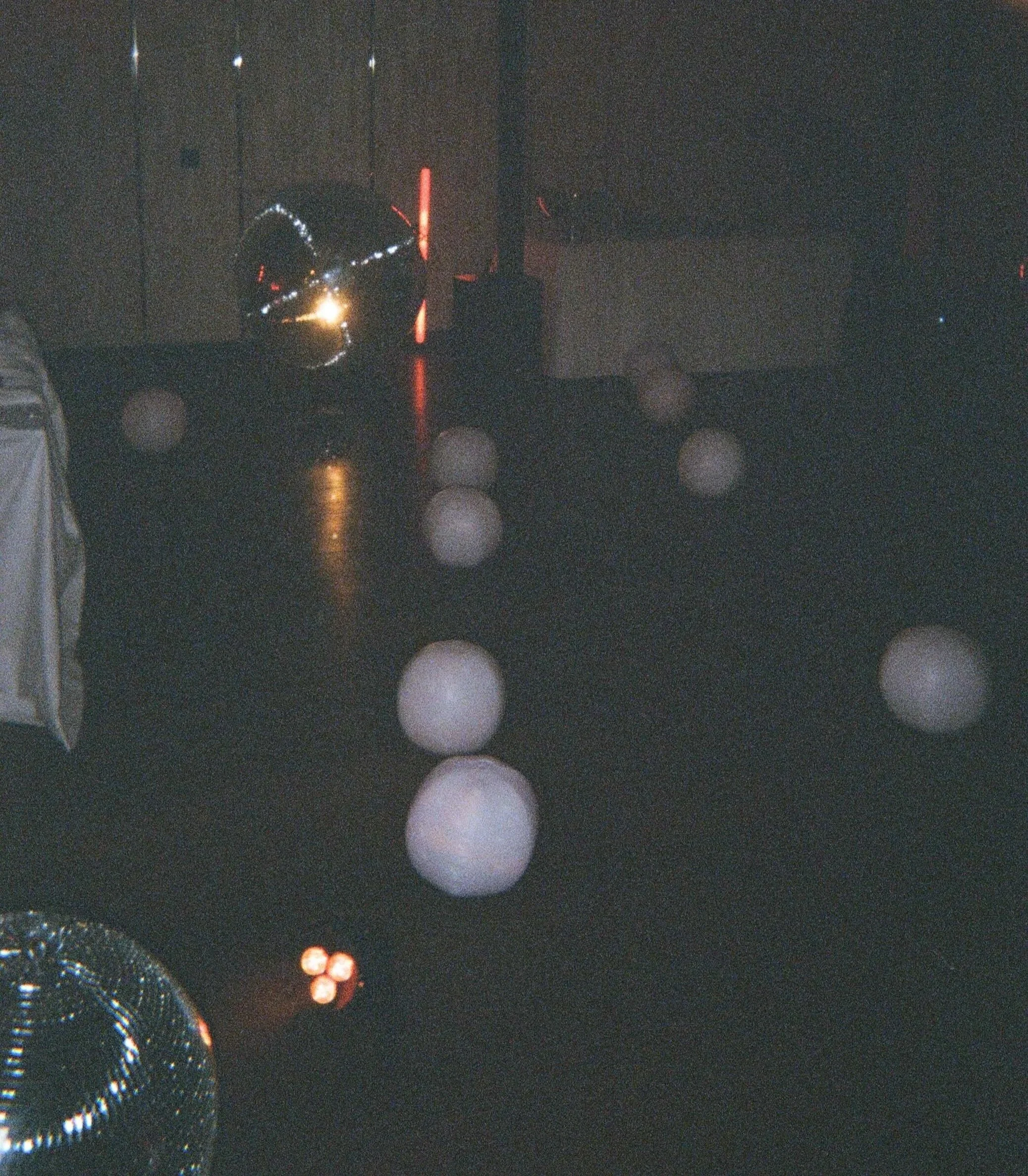 Disco ball installation at a luxury destination wedding at The Dolder Grand in Zurich, Switzerland, designed and styled by 11.11 Weddings.