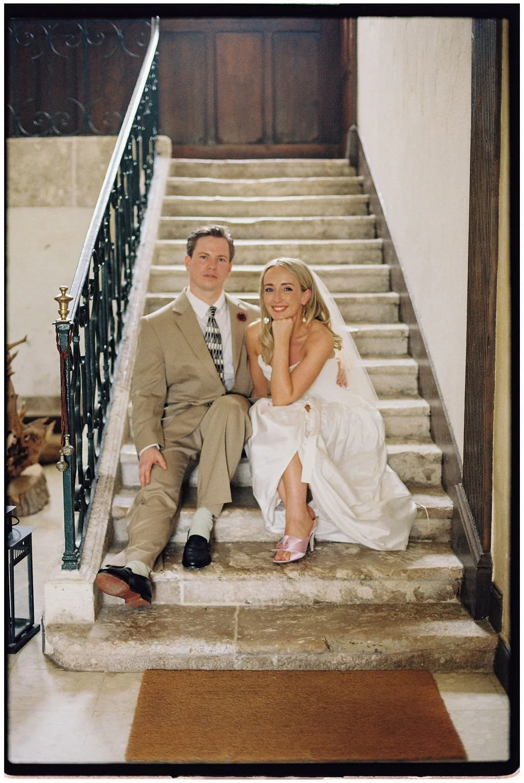 Bride and groom enjoying a romantic portrait in the gardens of Château Laborde Saint-Martin during their luxury Loire Valley destination wedding.