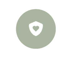 White shield with a heart symbol inside on a light green circular background.