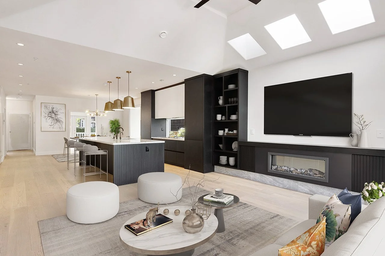 Modern open-concept living room and kitchen with white walls, light wood floors, black accents, a large flat-screen TV, a contemporary fireplace, and a kitchen island with gold pendant lights.