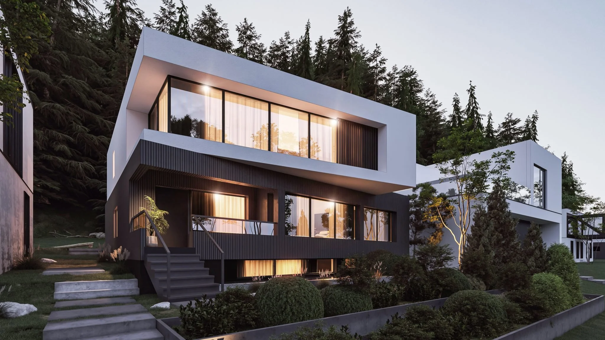 Modern two-story house with large windows, black and white exterior, surrounded by landscaped greenery and trees, during sunset.