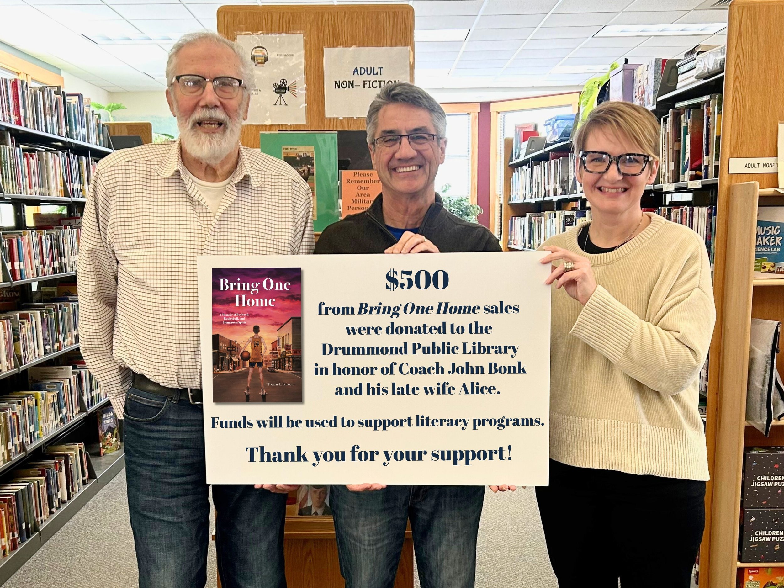 Donation to Drummond Public Library honors local coach