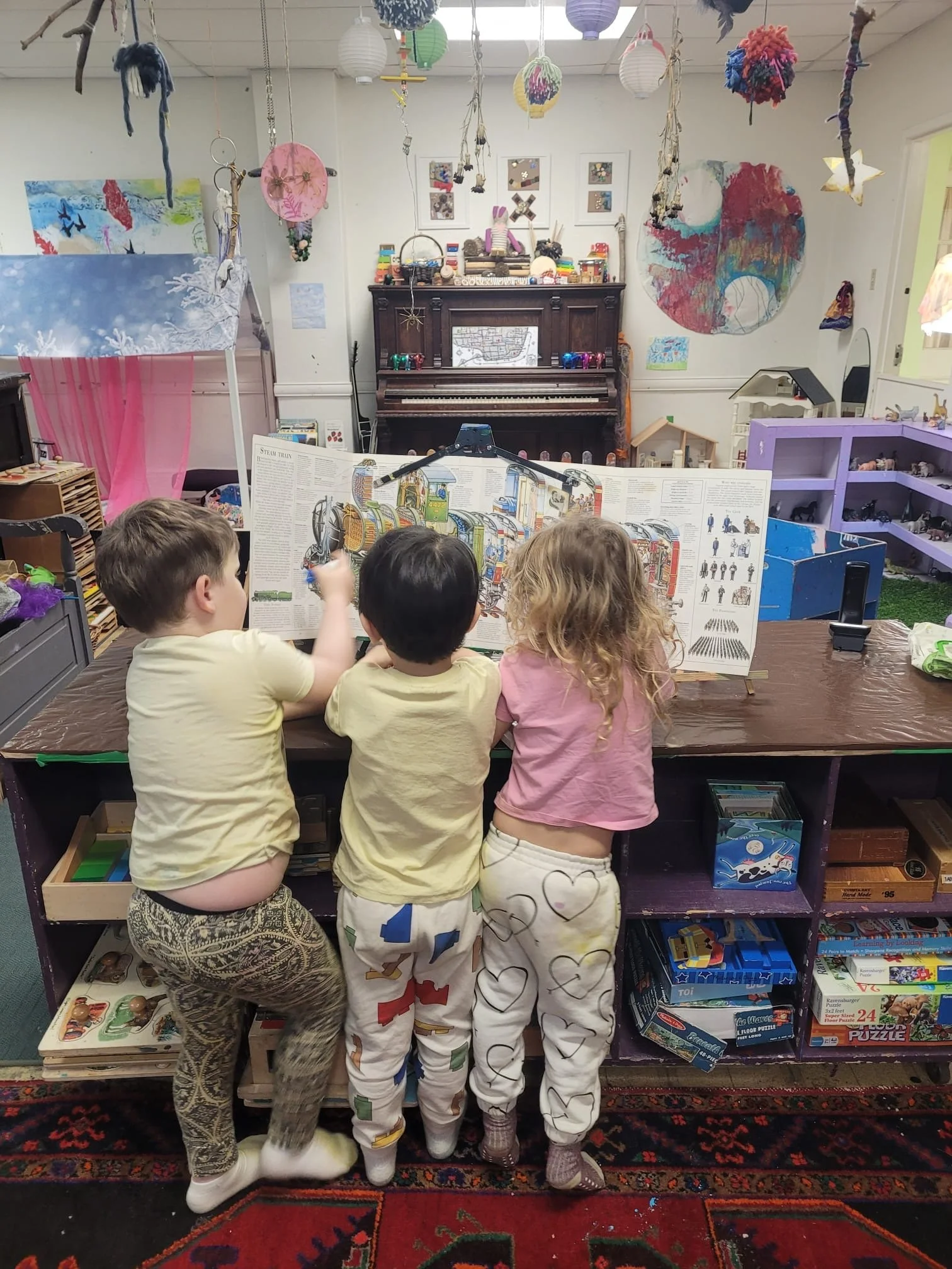 Roncy photo 3 kids & room.JPG