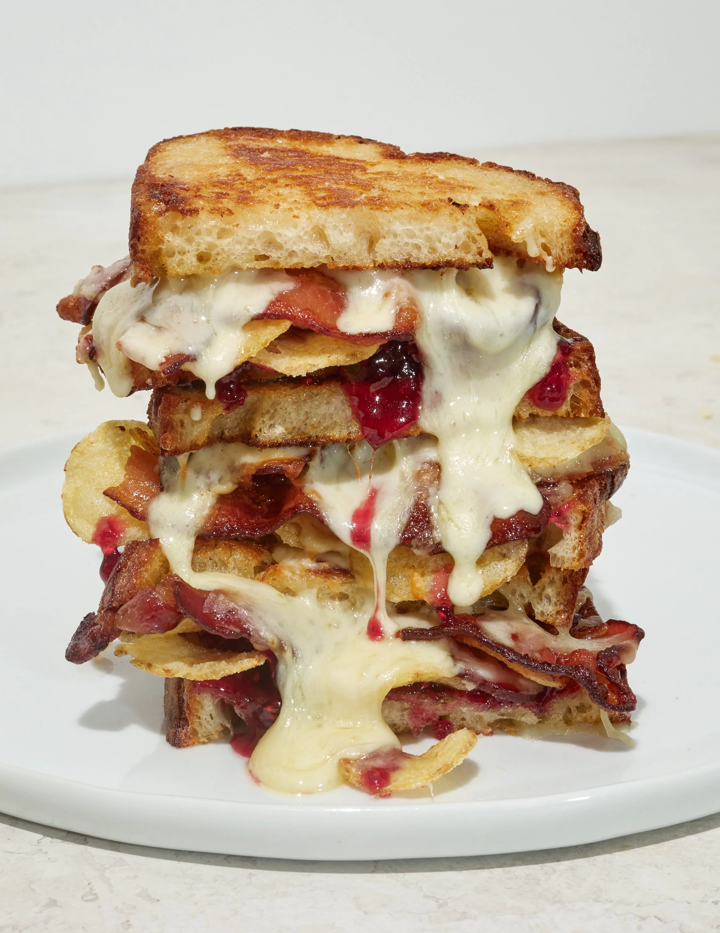 Potato Chip, Bacon, and Raspberry grilled cheese for Jen Hatmaker's cookbook, Feed These People. Image by Austin-based food photographer, Mackenzie Smith.