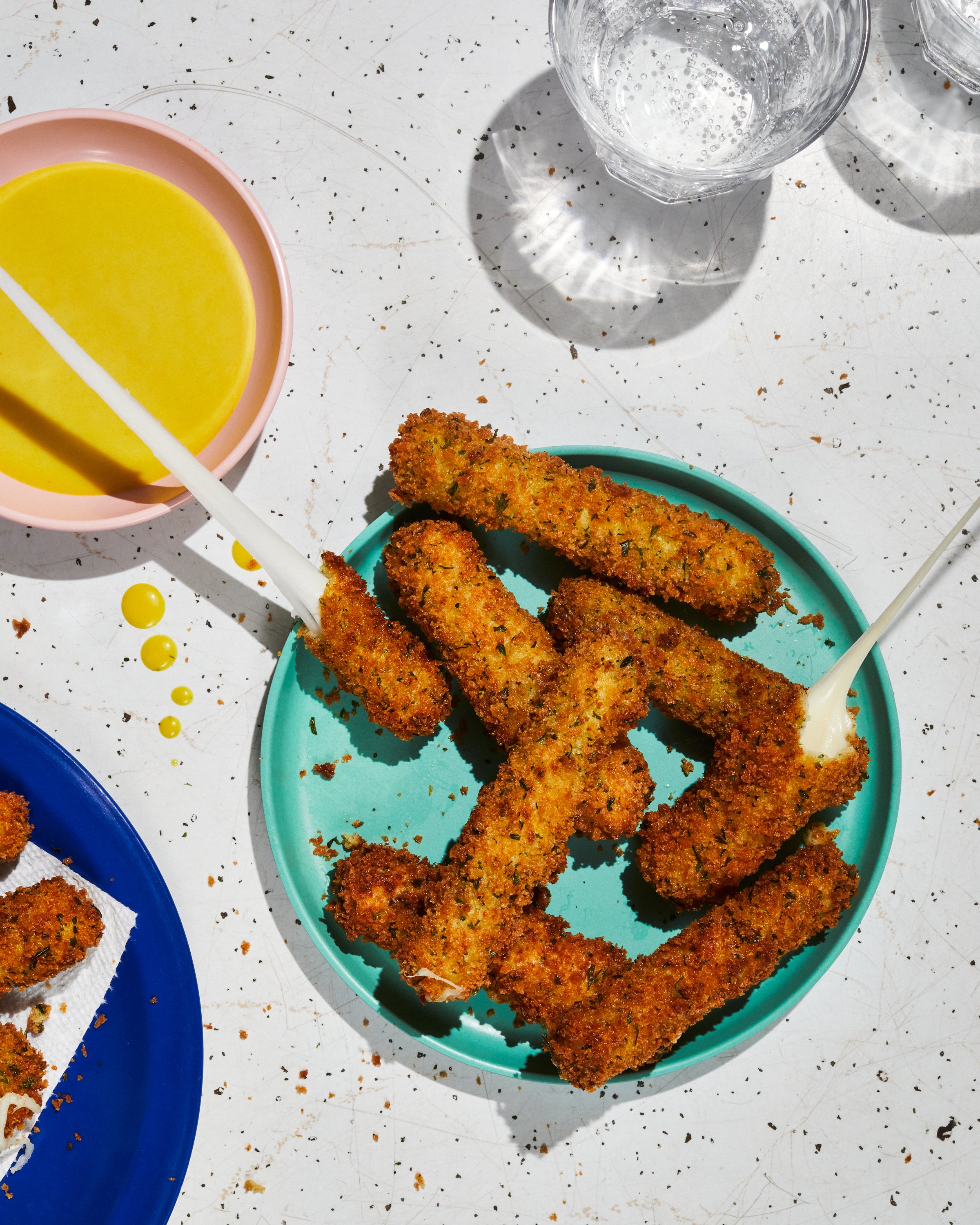 Homemade Mozzarella Sticks by Jen Hatmaker for her cookbook, Feed These People. Image by Austin-based cookbook photographer, Mackenzie Smith.