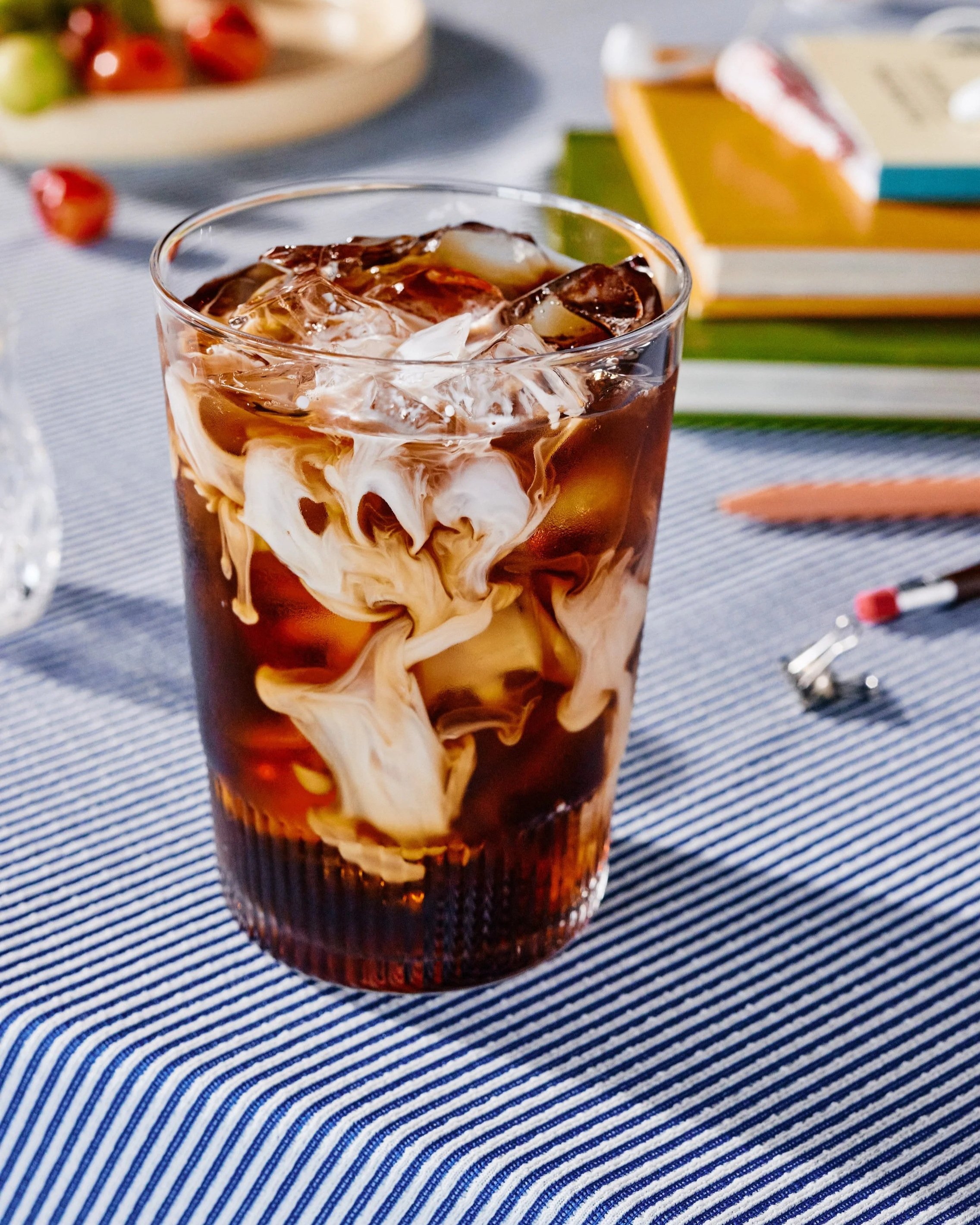 Iced coffee with cream. Image by Austin-based food and beverage photographer, Mackenzie Smith. Drink by Tyna Hoang, scene by Candice Putter. 