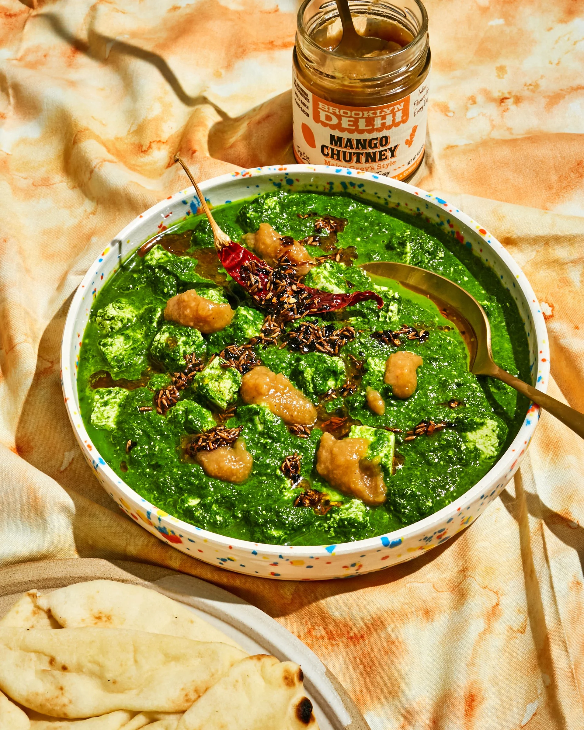 Saag with feta and mango chutney for Brooklyn Delhi. Food styling by Maite Aizpurua. Image by Austin-based food photographer, Mackenzie Smith.