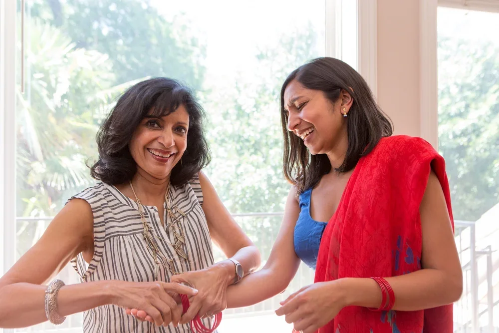 Ritu and Priya Krishna. Image by Austin-based portrait and lifestyle photographer, Mackenzie Smith.