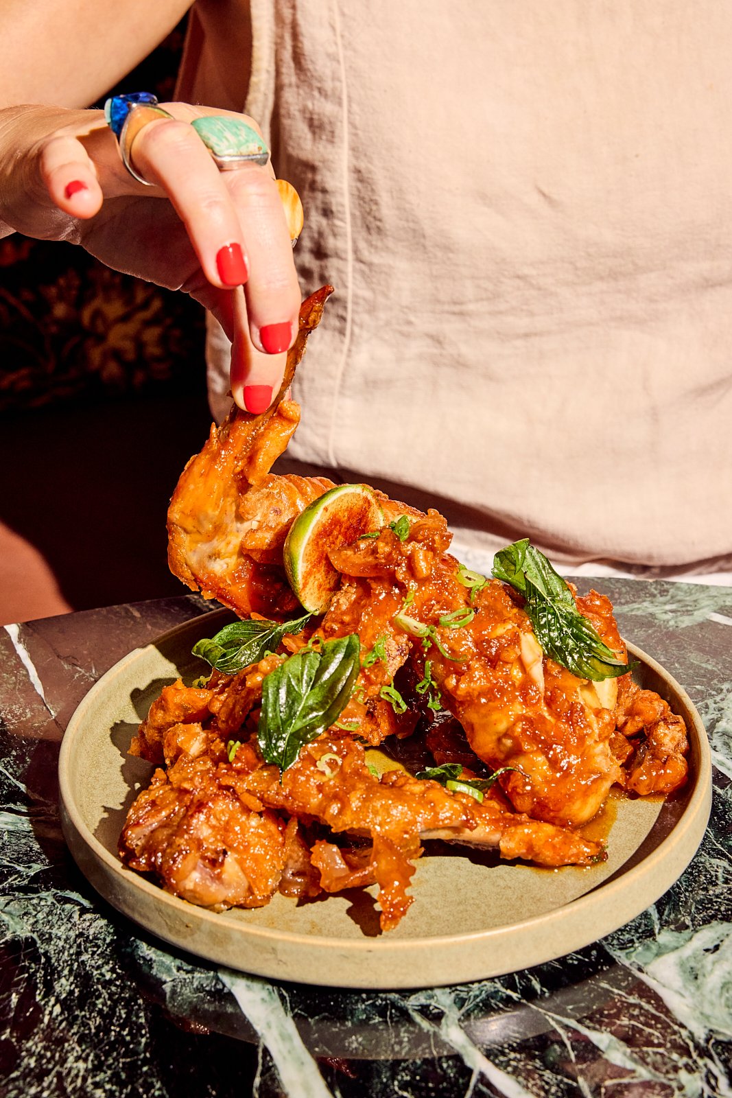 Ayam Penyet wings at Siti in Austin, TX. Image by Austin-based food photographer, Mackenzie Smith.