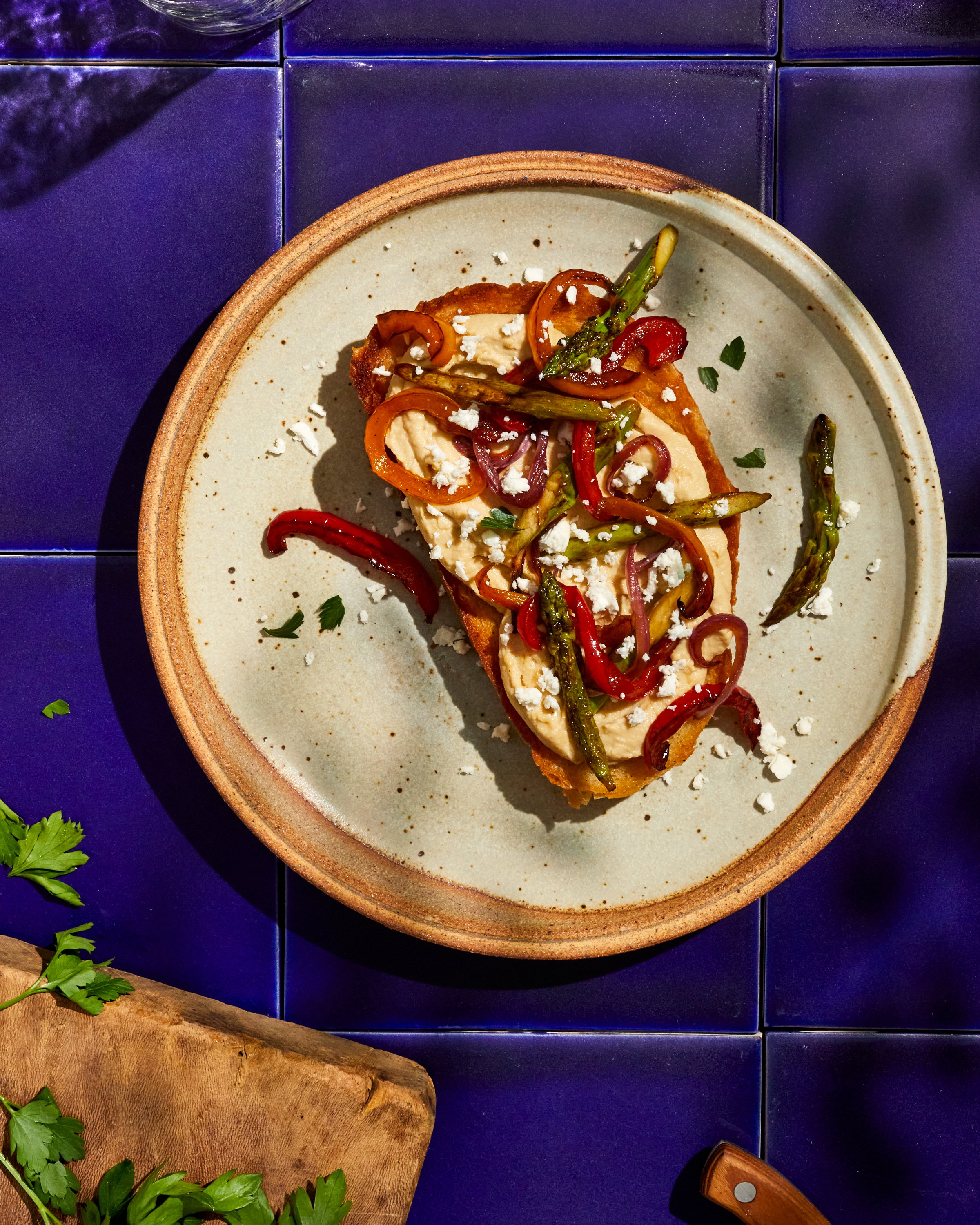 Roasted vegetable and hummus tartine for Jen Hatmaker's cookbook, Feed These People. Image by Austin-based cookbook photographer, Mackenzie Smith.