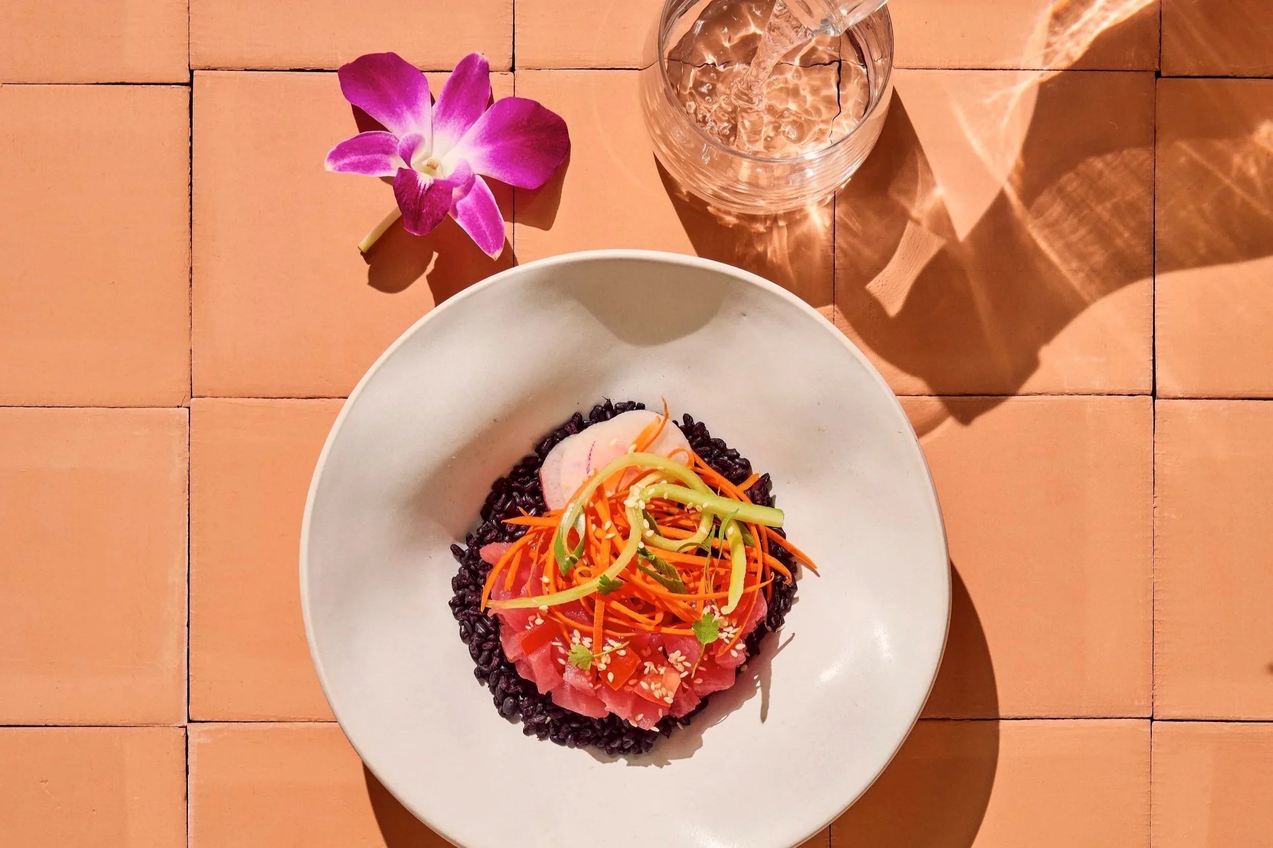Poke bowl by Chef Pete Ghione for Canyon Ranch Wellness Resorts. Props styled by Audrey K. Davis. Image by Austin-based food photographer, Mackenzie Smith.