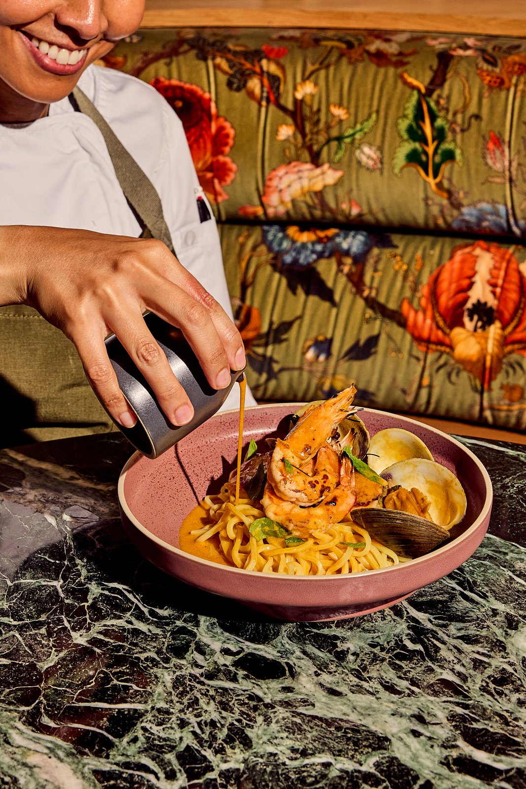 Siti's Laksa includes PEI mussels, wild gulf prawns, and fresh egg noodles. Image by Austin-based food photographer, Mackenzie Smith.