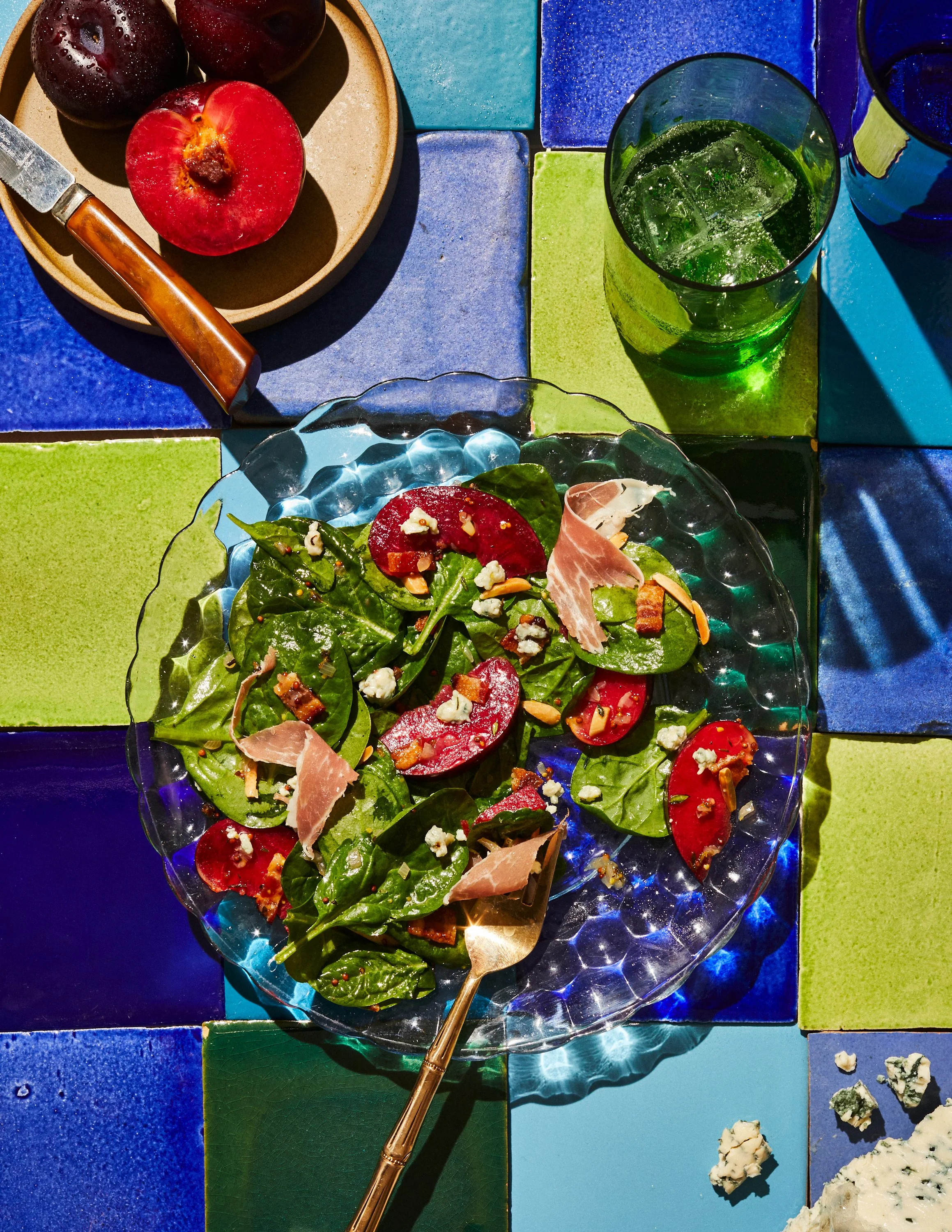 Plum and blue cheese salad with warm bacon vinaigrette for Jen Hatmaker's cookbook, Feed These People. Image by Austin-based cookbook photographer, Mackenzie Smith.