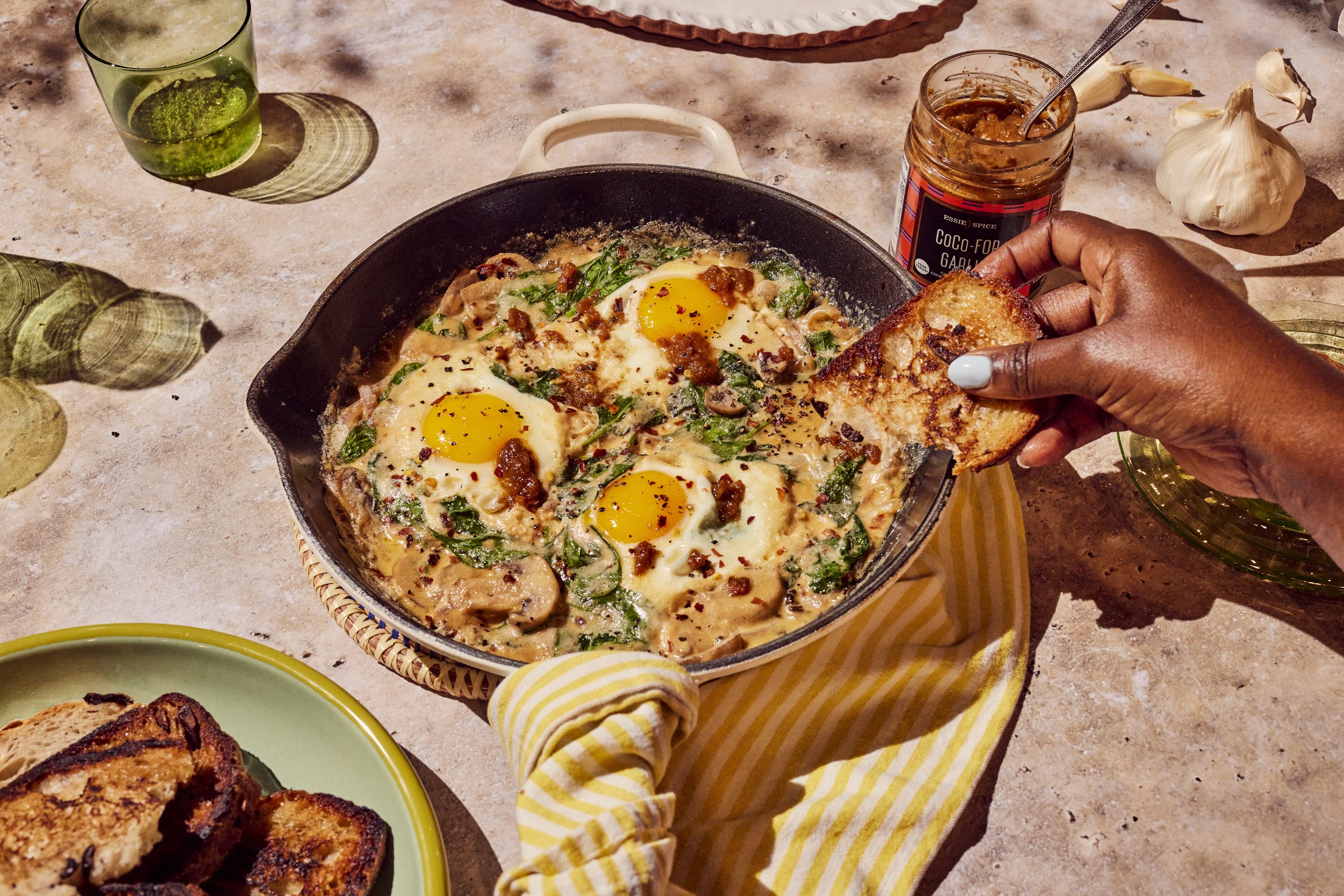 Baked eggs and toast with Essie Spice. Styling by Candice Putter. Image by Austin-based food photographer, Mackenzie Smith.