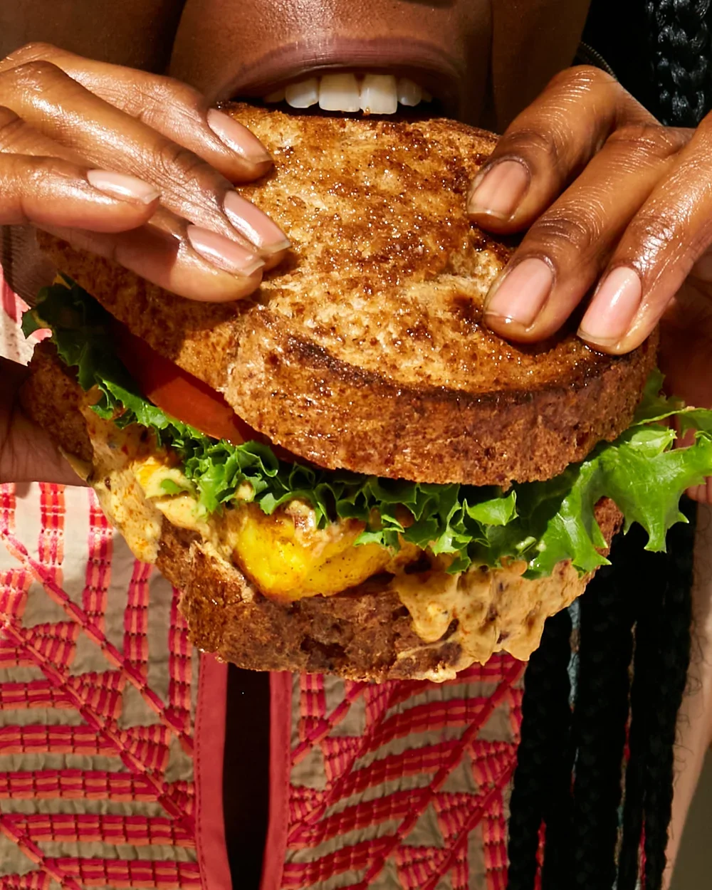 PLT, or paneer, lettuce, and tomato featuring Robin Beltran for Brooklyn Delhi. Image by Austin-based product photographer, Mackenzie Smith.