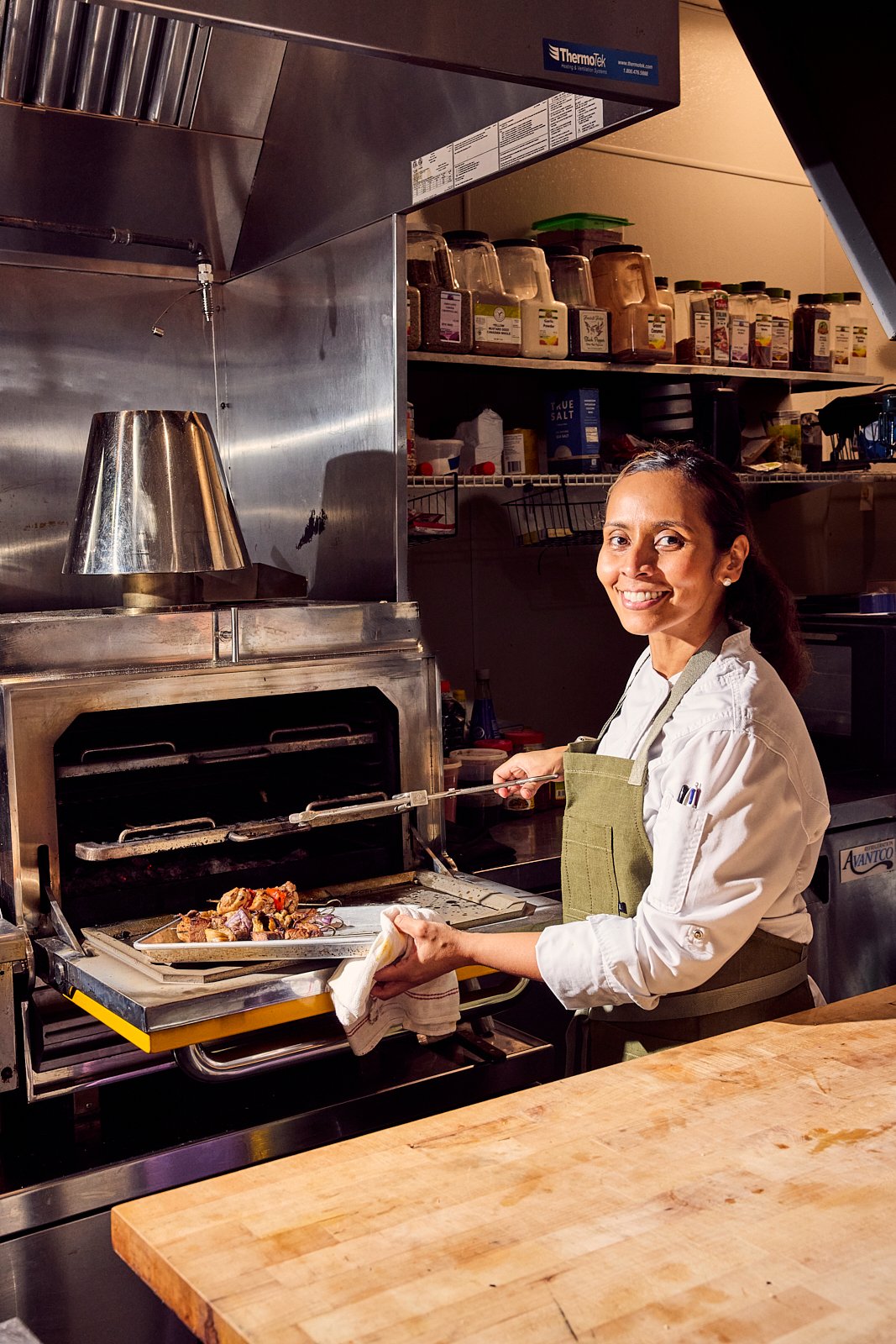 Chef Laila Bazahm in the kitchen at Siti. Image by Austin-based food and portrait photographer, Mackenzie Smith.