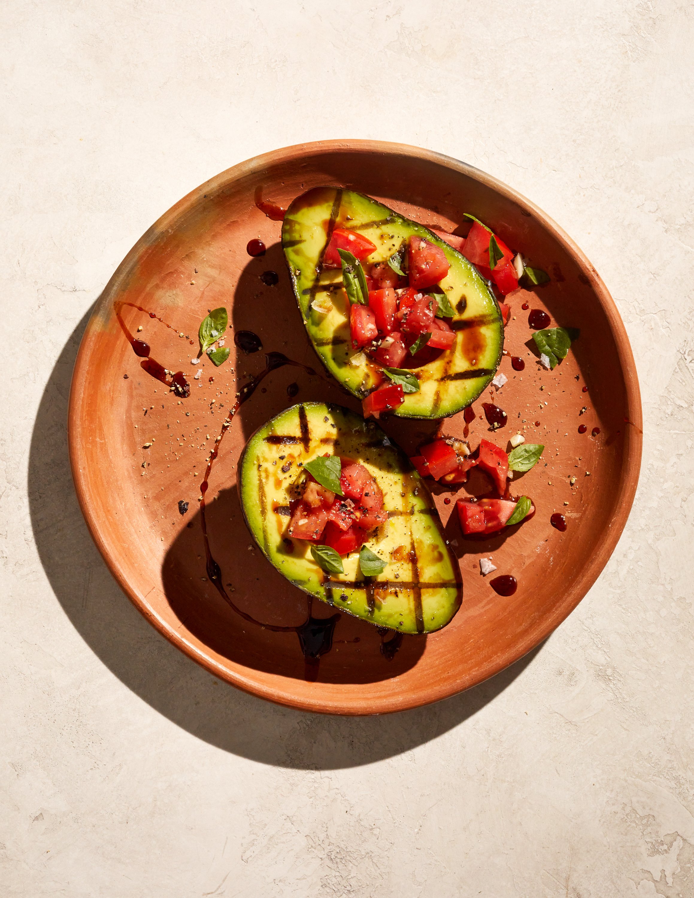 Grilled avocado balsamic bruschetta for Jen Hatmaker's cookbook, Feed These People. Image by Austin-based cookbook photographer, Mackenzie Smith.