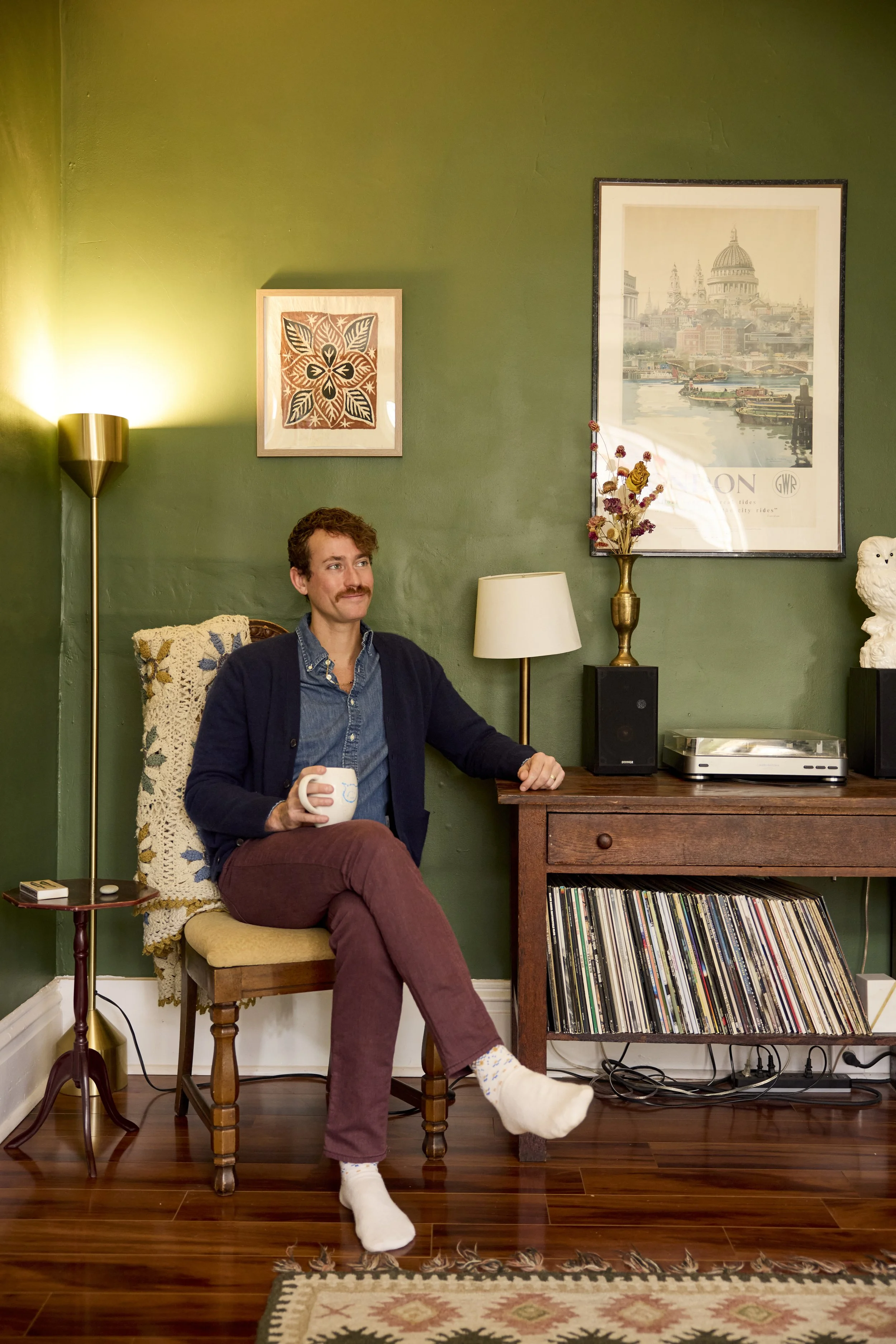 Alexander in his home in Pittsburgh, PA for Apartment Therapy. Image by Austin-based lifestyle and portrait photographer, Mackenzie Smith.