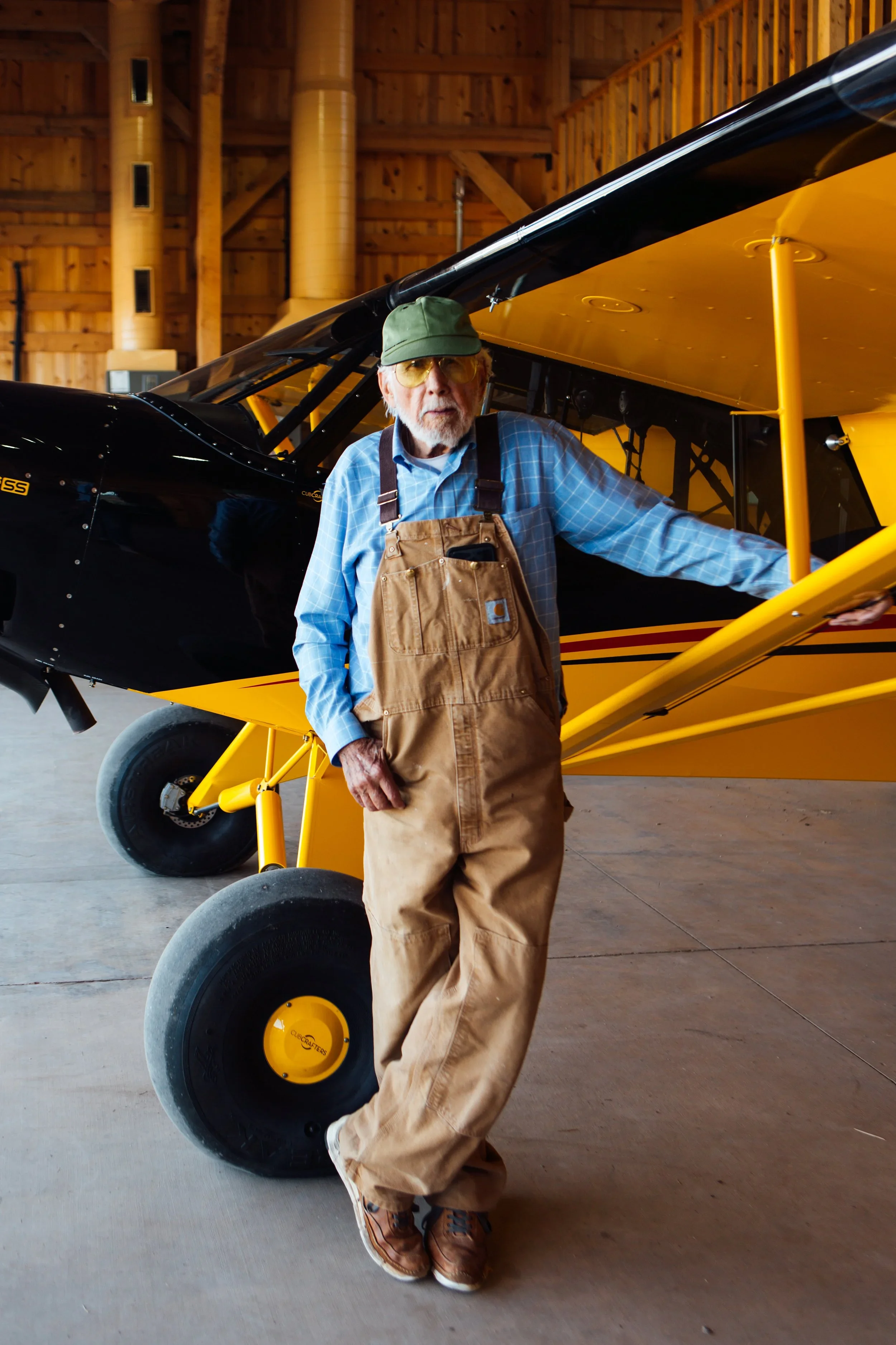 Buzz Hurt with his airplane in Odessa, Texas. Image by Austin-based portrait and lifestyle photographer, Mackenzie Smith.