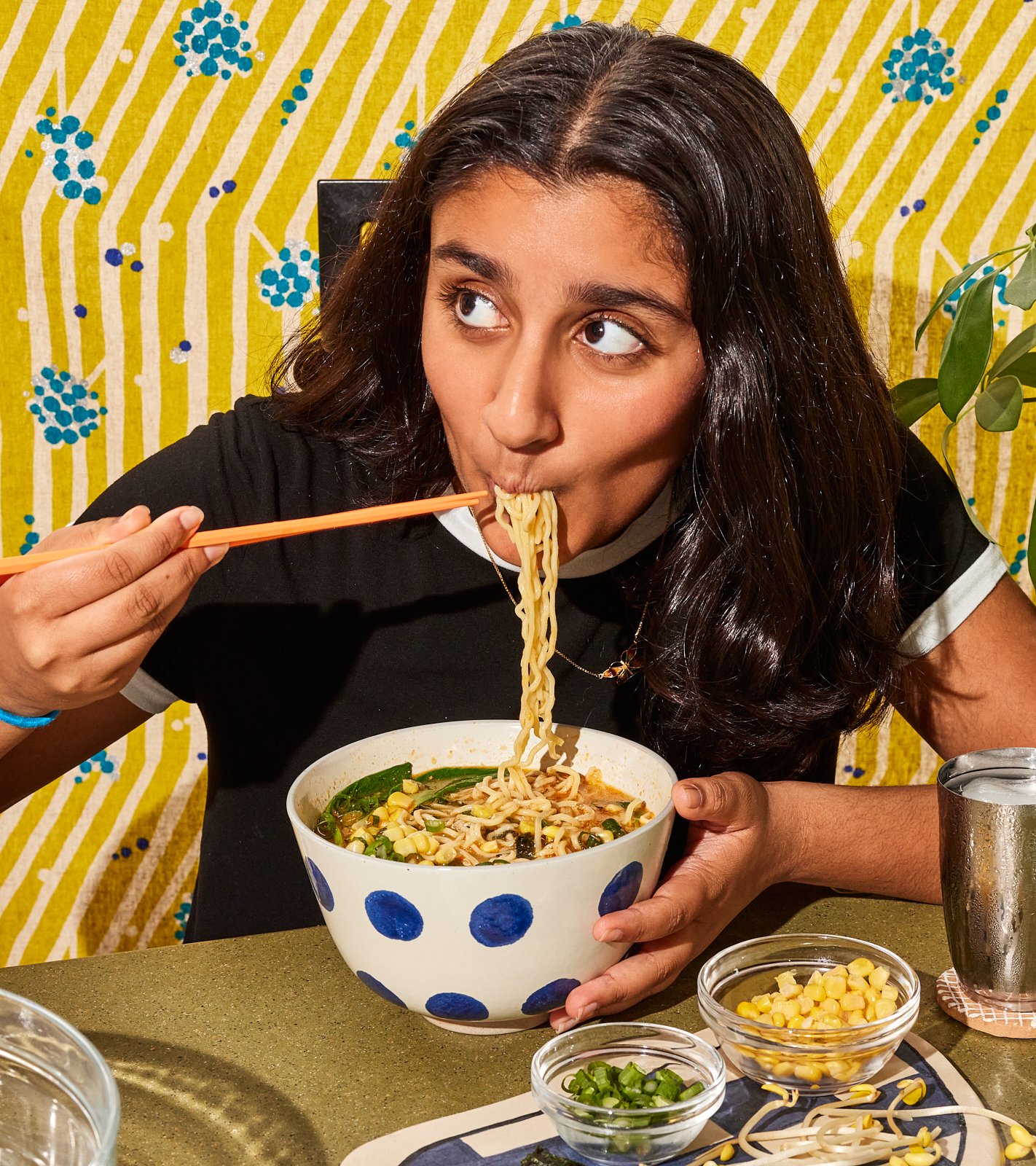 Eating ramen for Priya's Kitchen Adventures cookbook. Image by Austin-based food and lifestyle photographer, Mackenzie Smith.