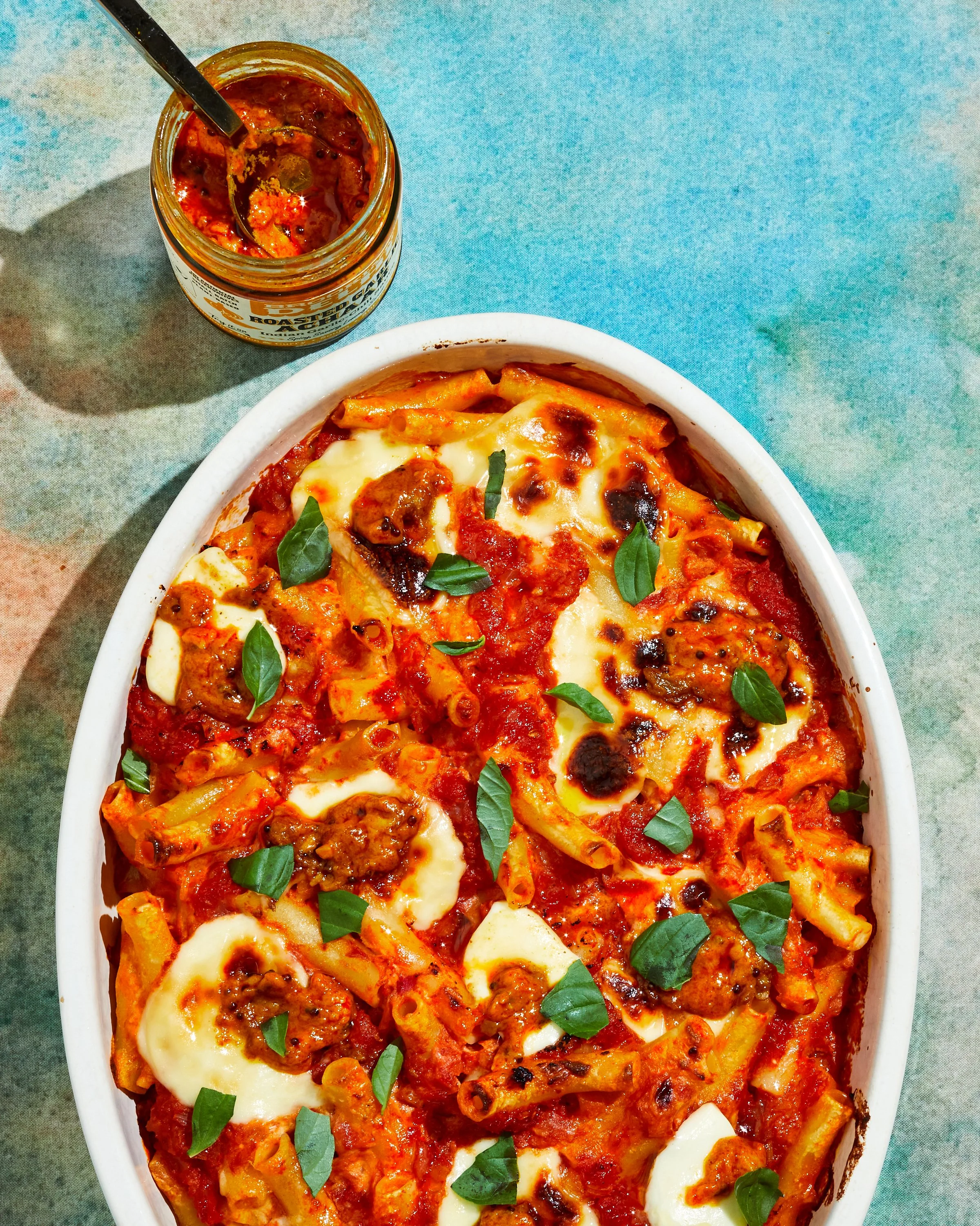 Baked pasta dish topped with Brooklyn Delhi chutney. Food styling by Maite Aizpurua. Image by Austin-based food and product photographer, Mackenzie Smith.