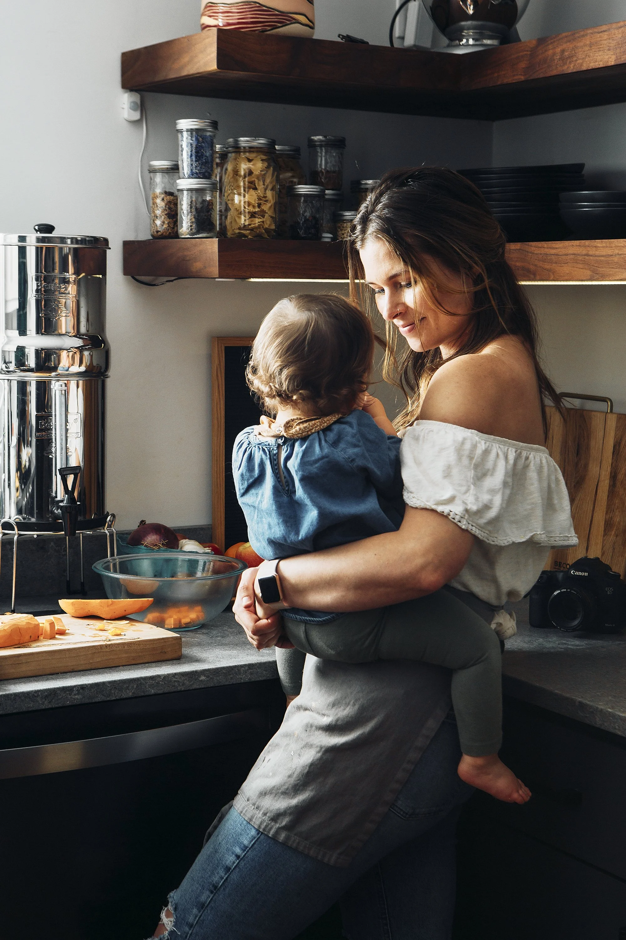 Ashleigh Amoroso in her kitchen. Image by Austin-based lifestyle and portrait photographer, Mackenzie Smith.