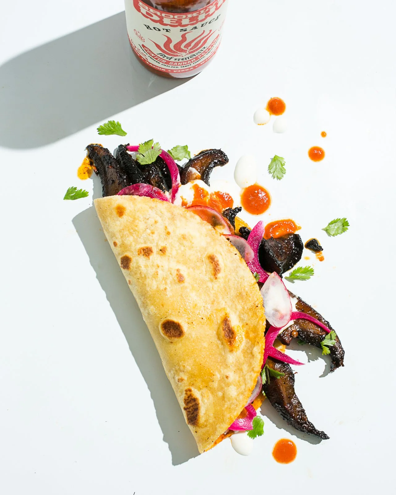Mushroom taco for Brooklyn Delhi. Food styling by Maite Aizpurua. Image by Austin-based food photographer, Mackenzie Smith.