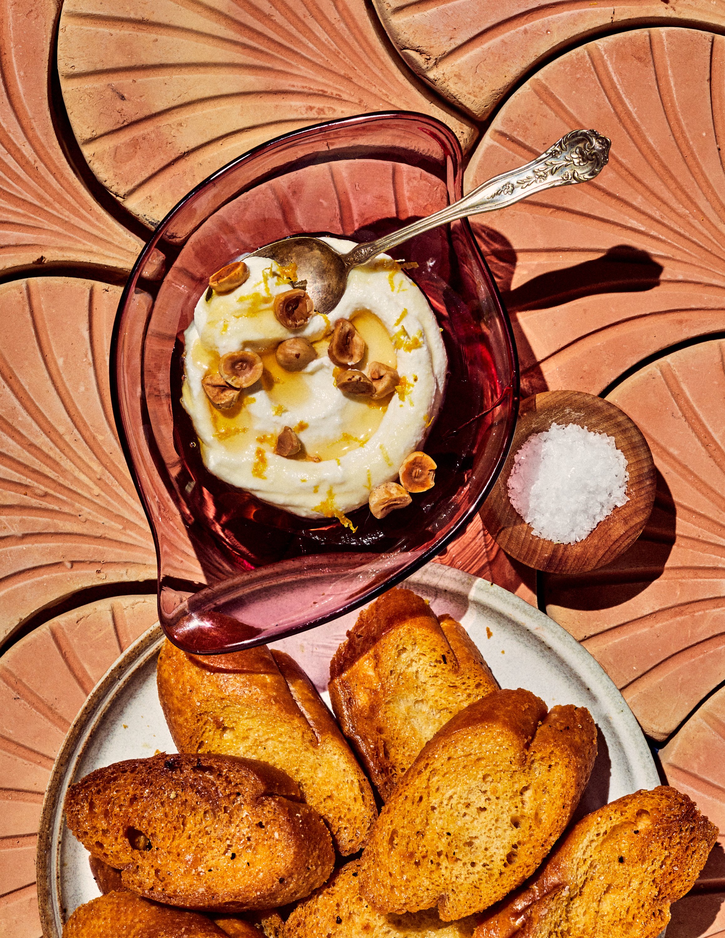 Honey Lemon Ricotta with Toasted Hazelnuts by Jen Hatmaker for her cookbook Feed These People. Image by Austin-based food photographer, Mackenzie Smith.