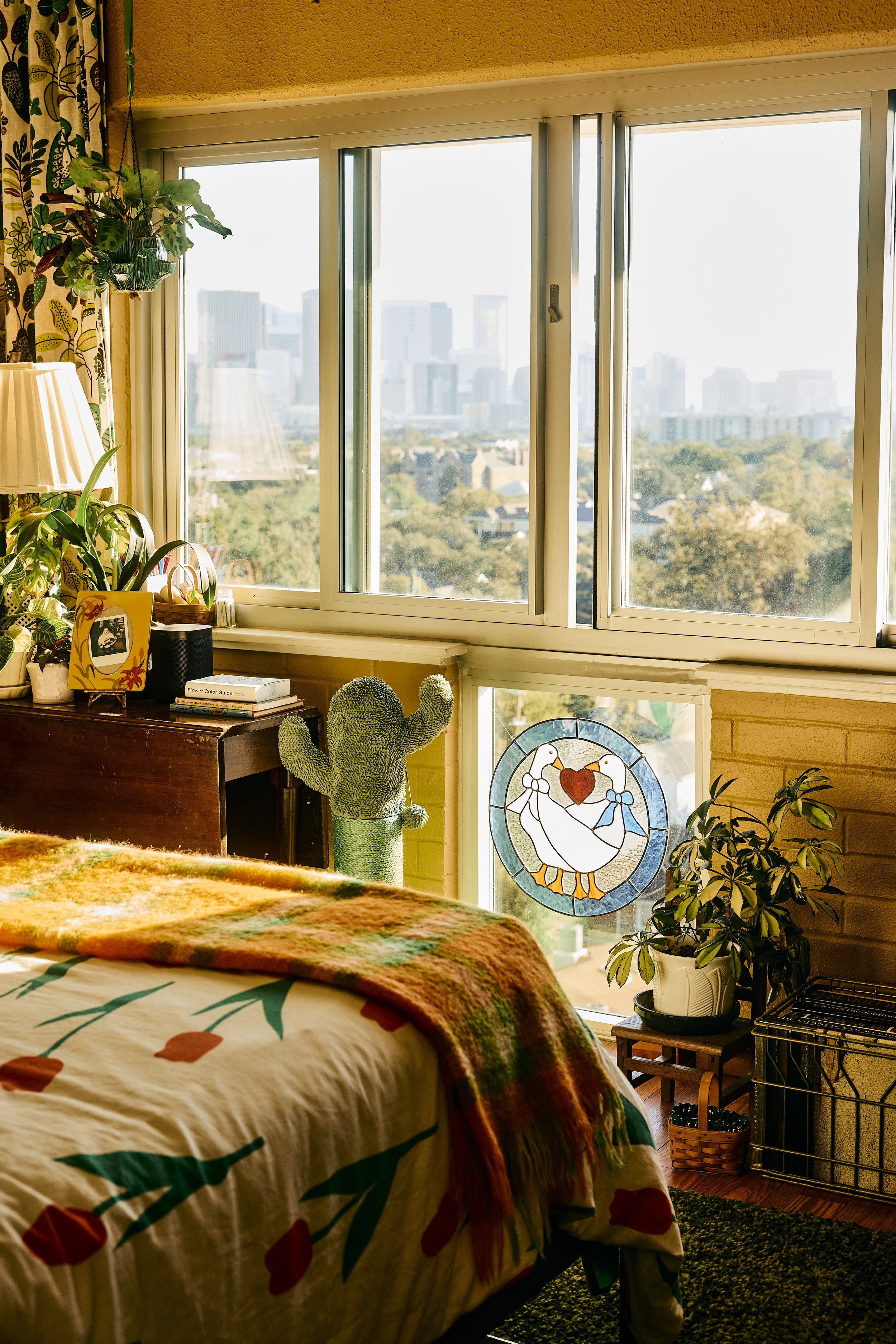 Zach and Taylor's bedroom view of the Houston skyline. Image by Austin-based lifestyle photographer, Mackenzie Smith.