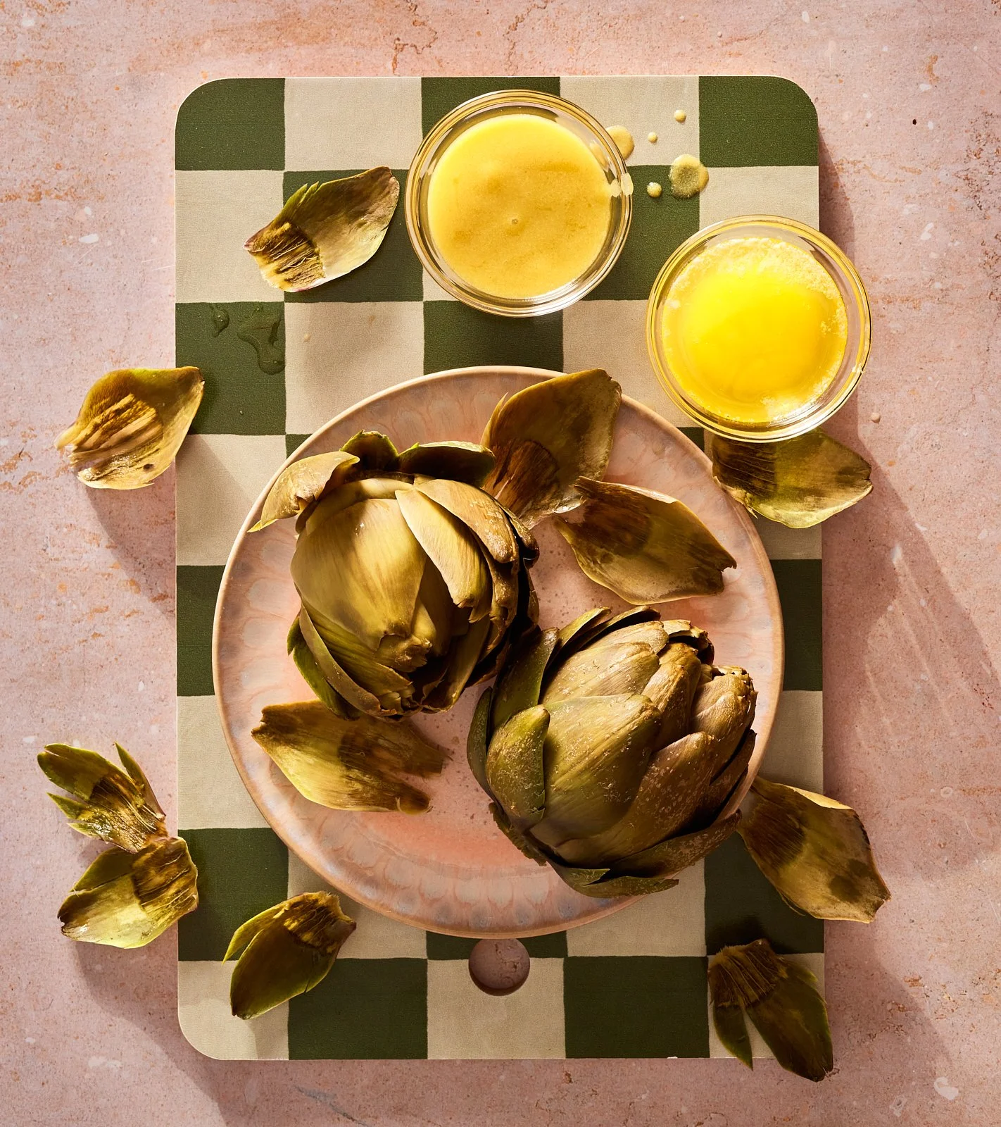 Artichokes with butter for Priya's Kitchen Adventures cookbook. Image by Austin-based food photographer, Mackenzie Smith.