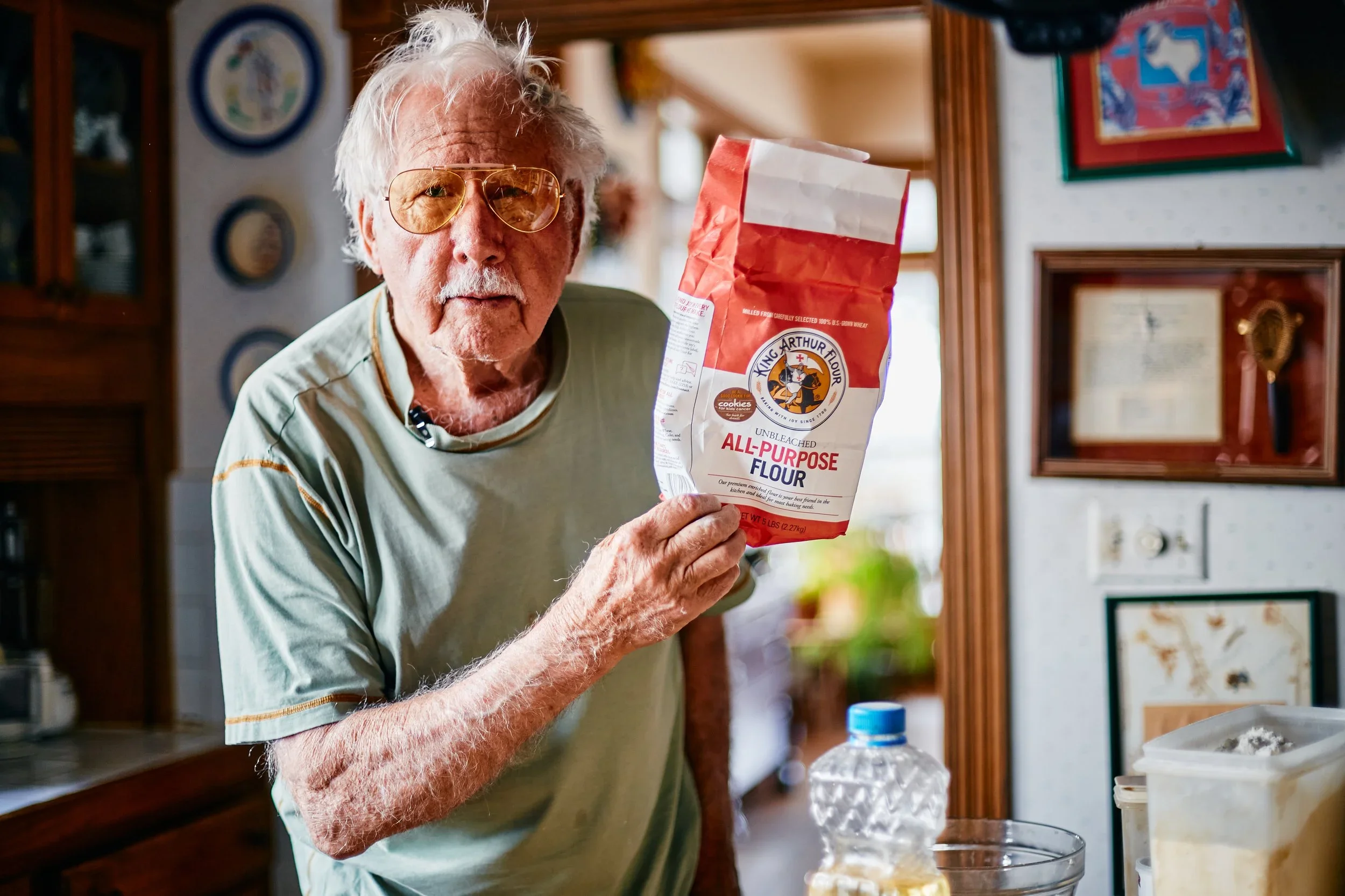 Buzz Hurt, 2014, baking bread in his artisanal kitchen. Image by Austin-based portrait and food photographer, Mackenzie Smith.