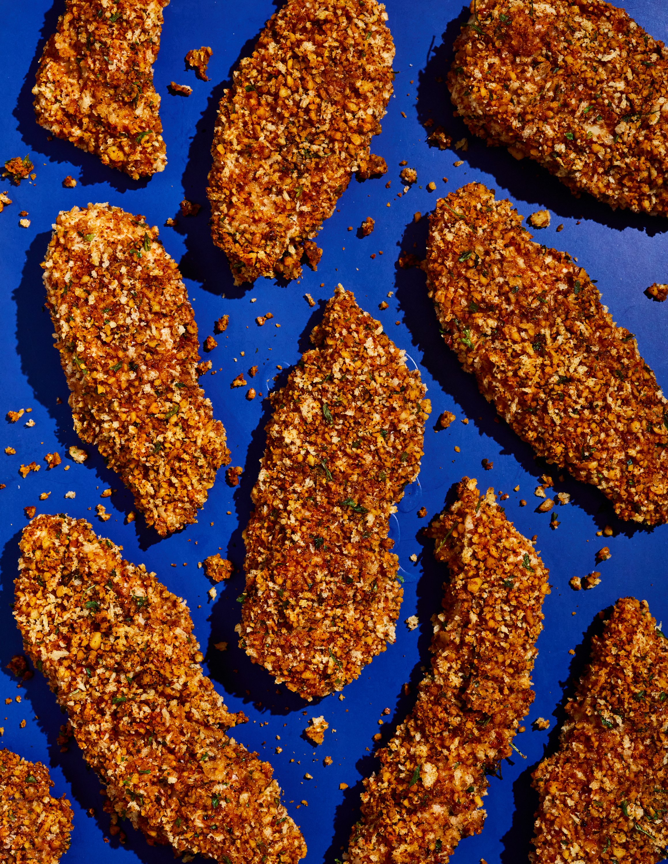 Pecan-crusted chicken strips for Jen Hatmaker's cookbook, Feed These People. Image by Austin-based food photographer, Mackenzie Smith.