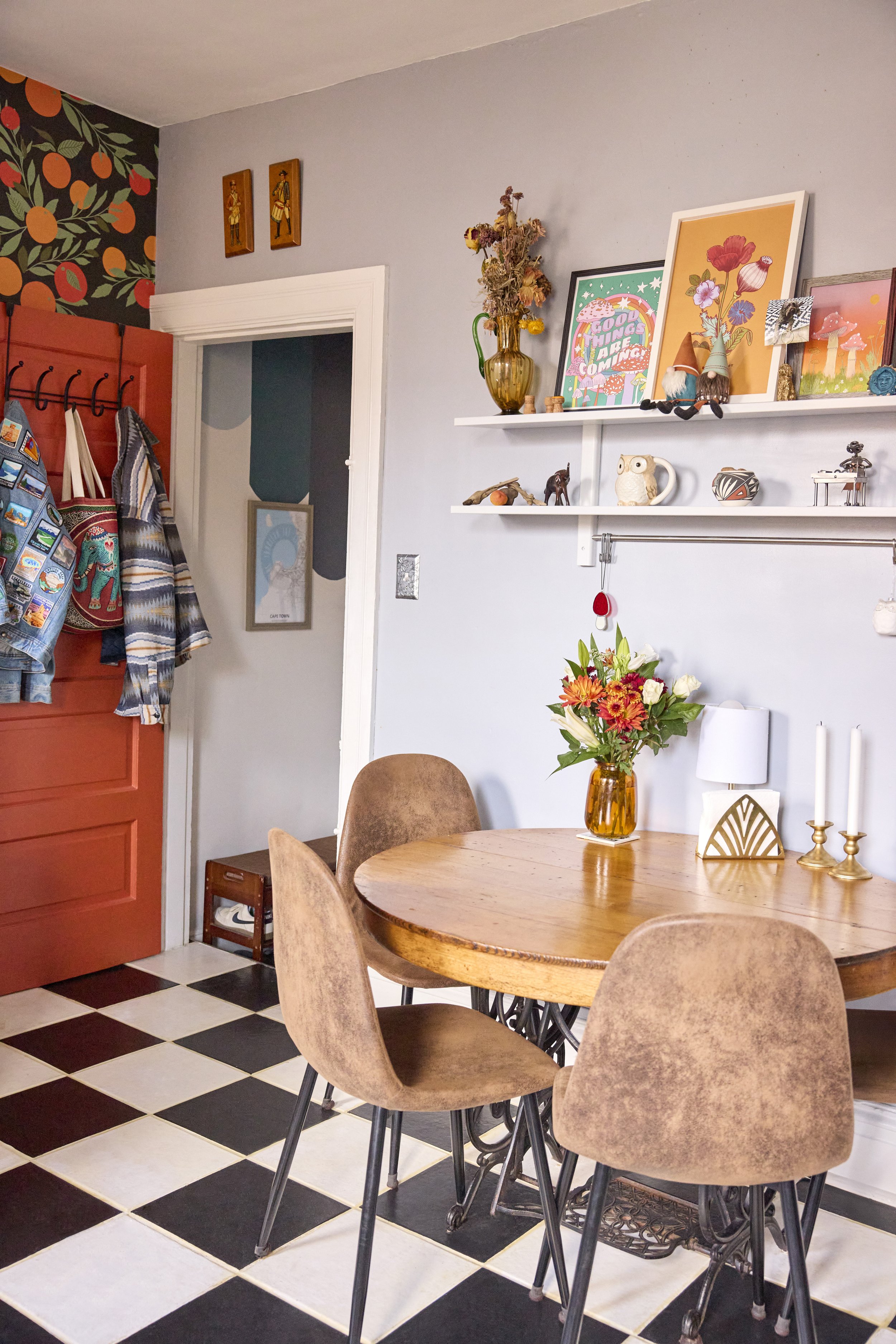Dining room with black and white checkered flooring. Image by Austin-based lifestyle photographer, Mackenzie Smith.