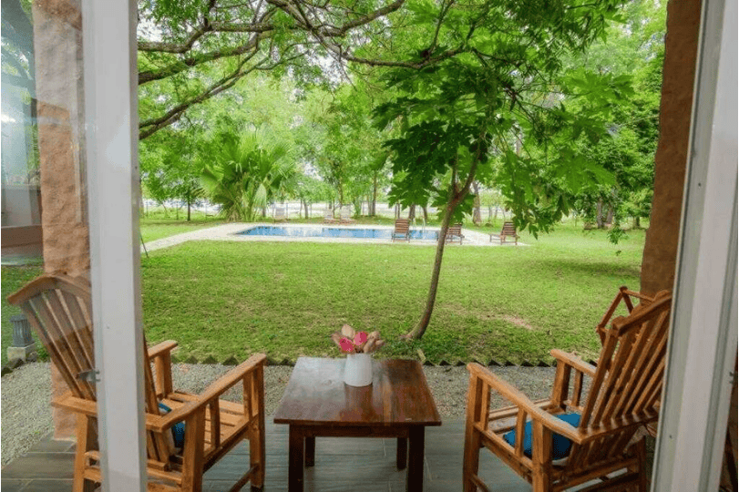 Tranquil Wild Boutique Hotel private terrace with pool view.png