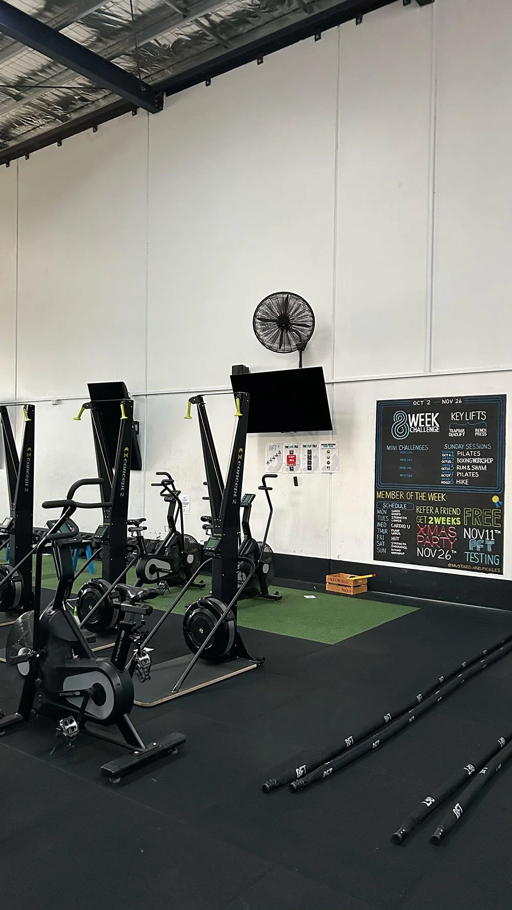 A photo of the inside of a group fitness gym with equipment set up.
