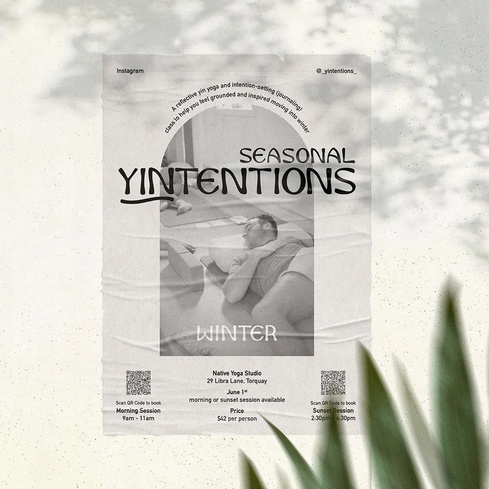 A poster on a wall with a plant in the foreground. It says the Words Winter Seasonal YINtentions on it and there is a photo of a man laying down stretching.