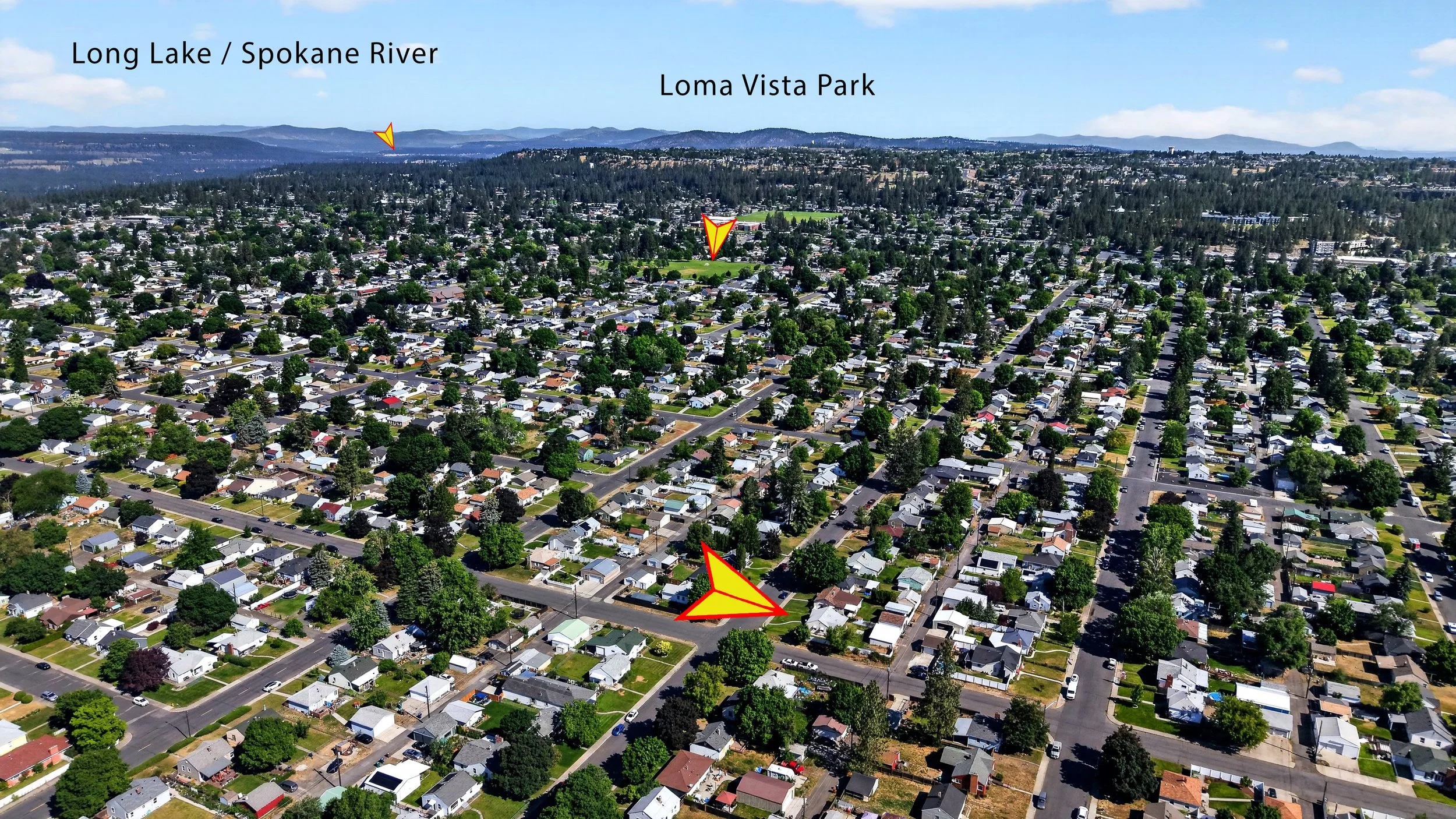An aerial view of a residential neighborhood with numerous houses, trees, and streets. The image highlights Long Lake / Spokane River in the background, with Loma Vista Park also labeled. Red and yellow arrows point to specific locations within the n