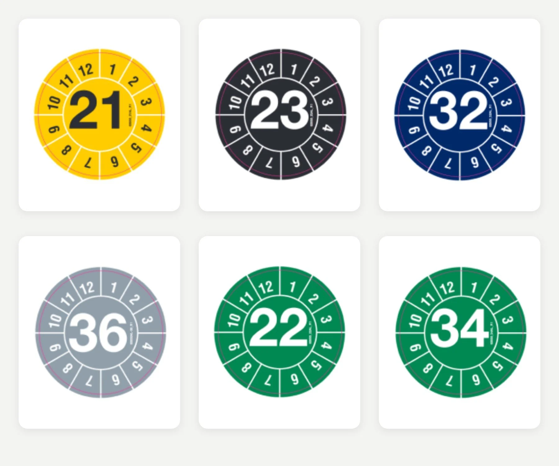 Grille de six autocollants circulaires numérotés 21, 23, 32, 36, 22 et 34, dans différentes couleurs.