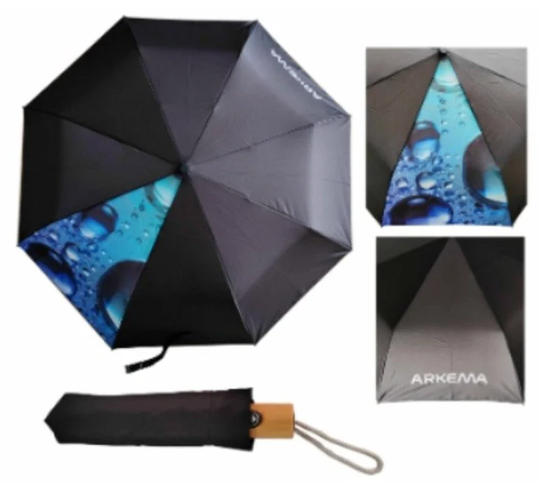 Parapluie pliable noir ARKEMA avec motif de bulles bleues, présenté ouvert et fermé avec sa housse.