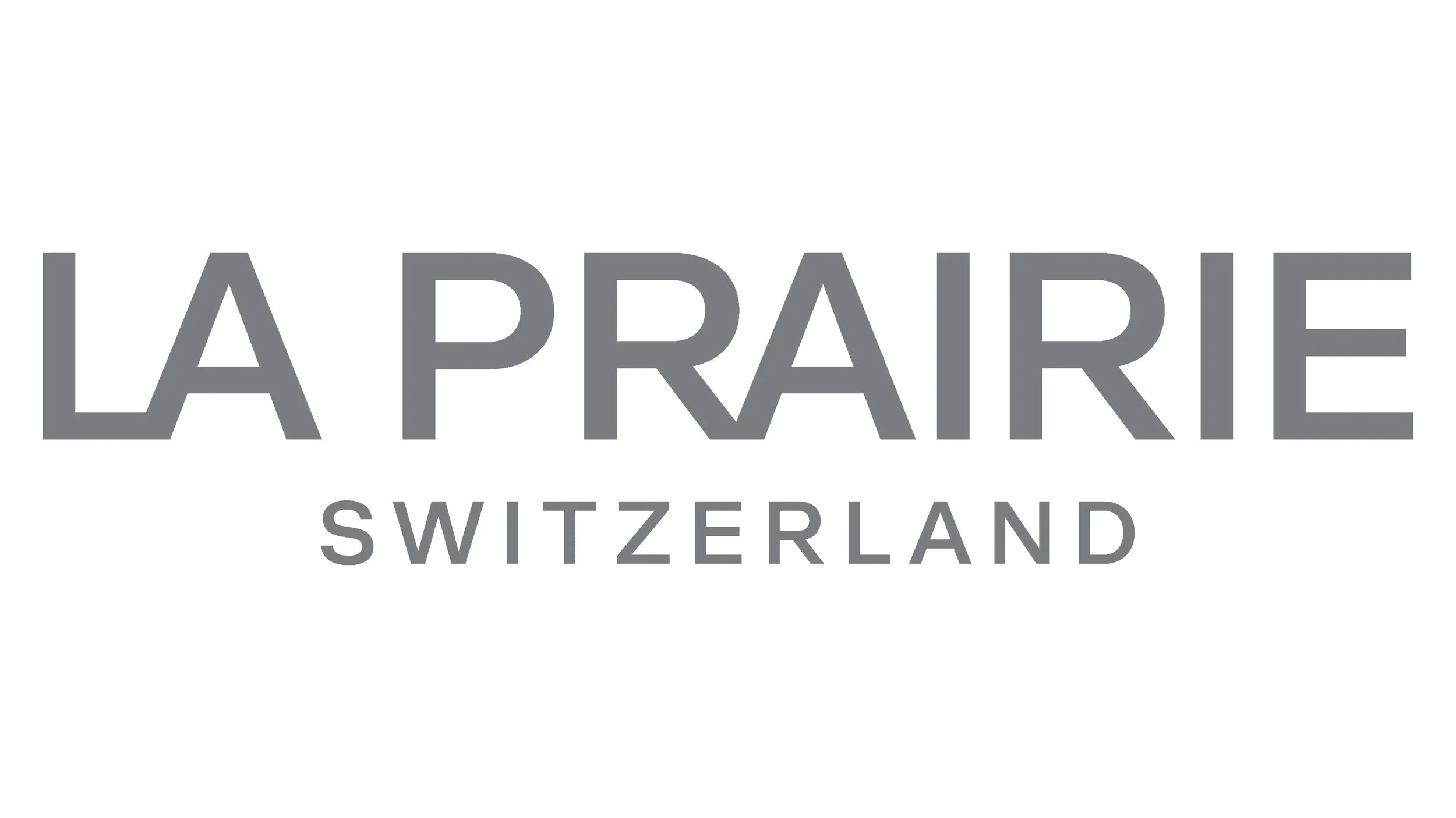 Logo with text 'LA PRAIRIE SWITZERLAND' in gray on a white background.