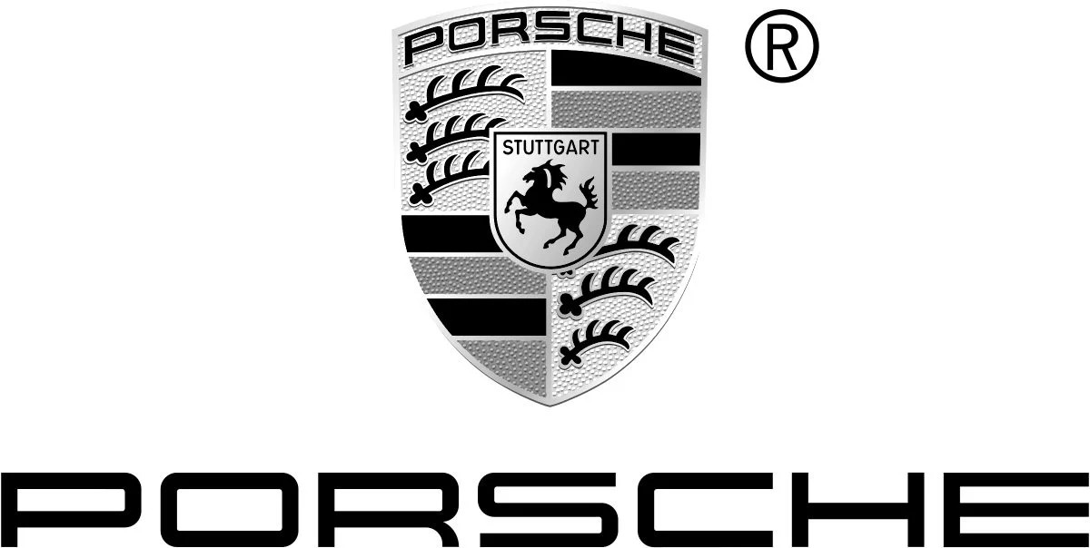 Black and white Porsche logo with a shield shape shield featuring a horse and the word 'Stuttgart' and horizontal black and gray stripes, with the word 'Porsche' underneath.