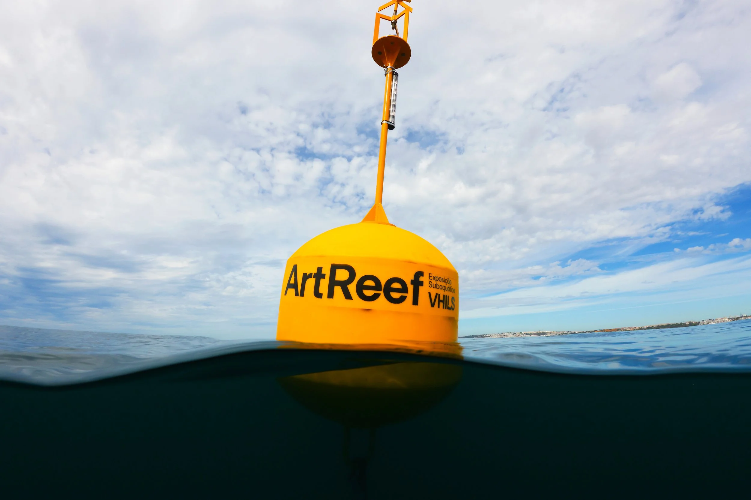 Buoy positioned above the site of the underwater exhibition by Vhils