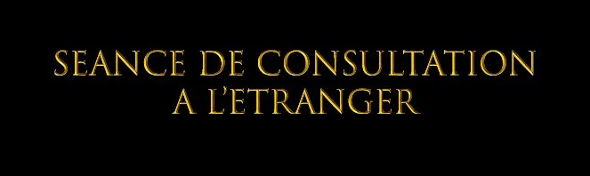 Texte en français indiquant une séance de consultation à l'étranger, en lettres dorées sur fond noir.
